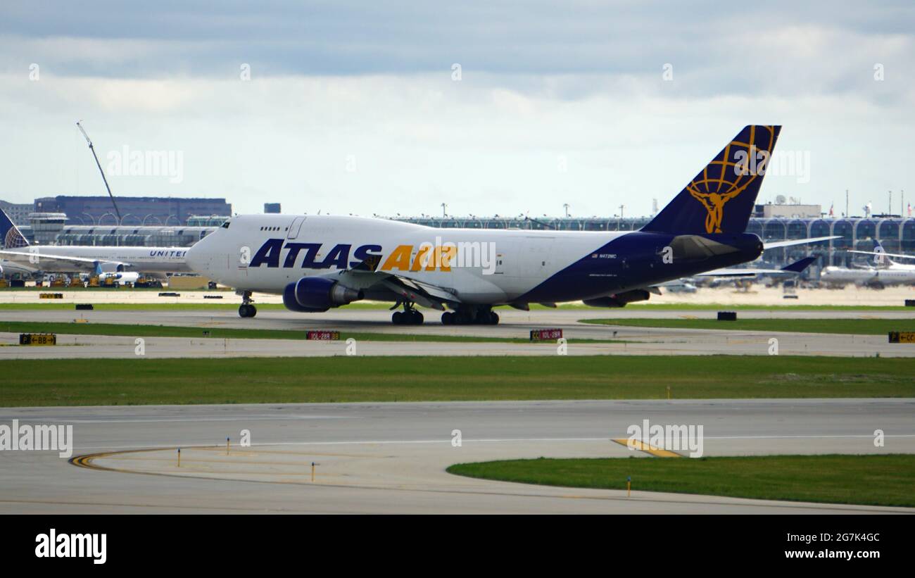 CHICAGO, UNITED STATES - Jul 04, 2021: The Atlas Air Boeing 747 cargo plane taxiing on the runway after landing at Chicago O'Hare airport Stock Photo