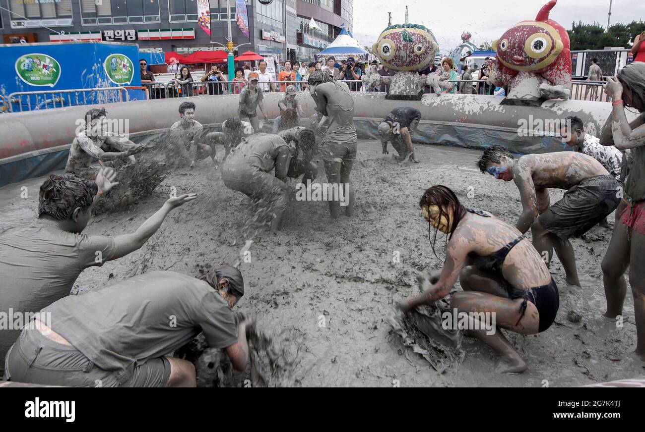 July 15 2021 Boryeong South Korea A Visitors Enjoying Wrestle In The july-15-2021-boryeong-south-korea-a-visitors-enjoying-wrestle-in-the