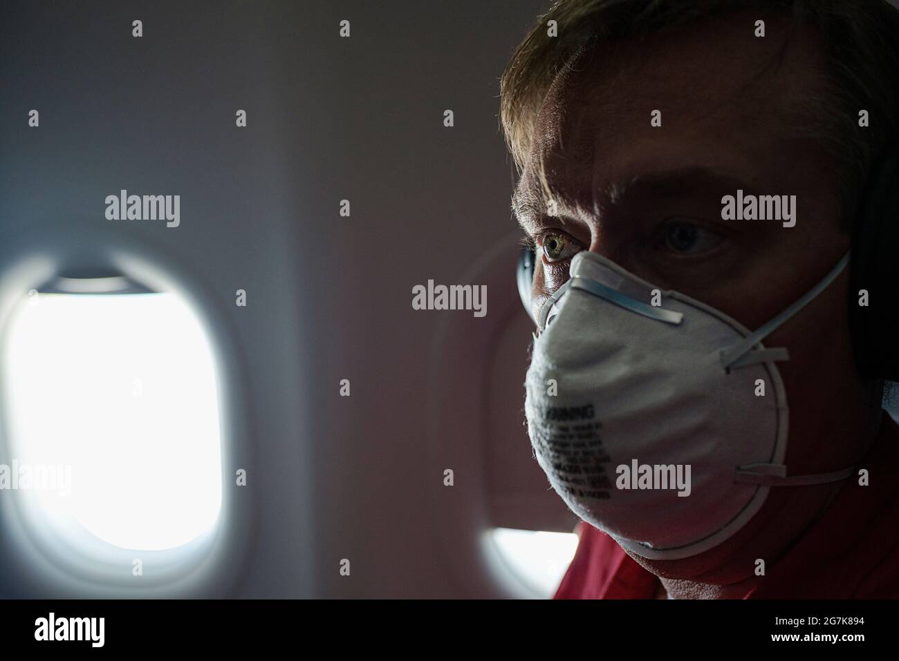 A man flying on April 25, 2020 during the COVID pandemic. Stock Photo