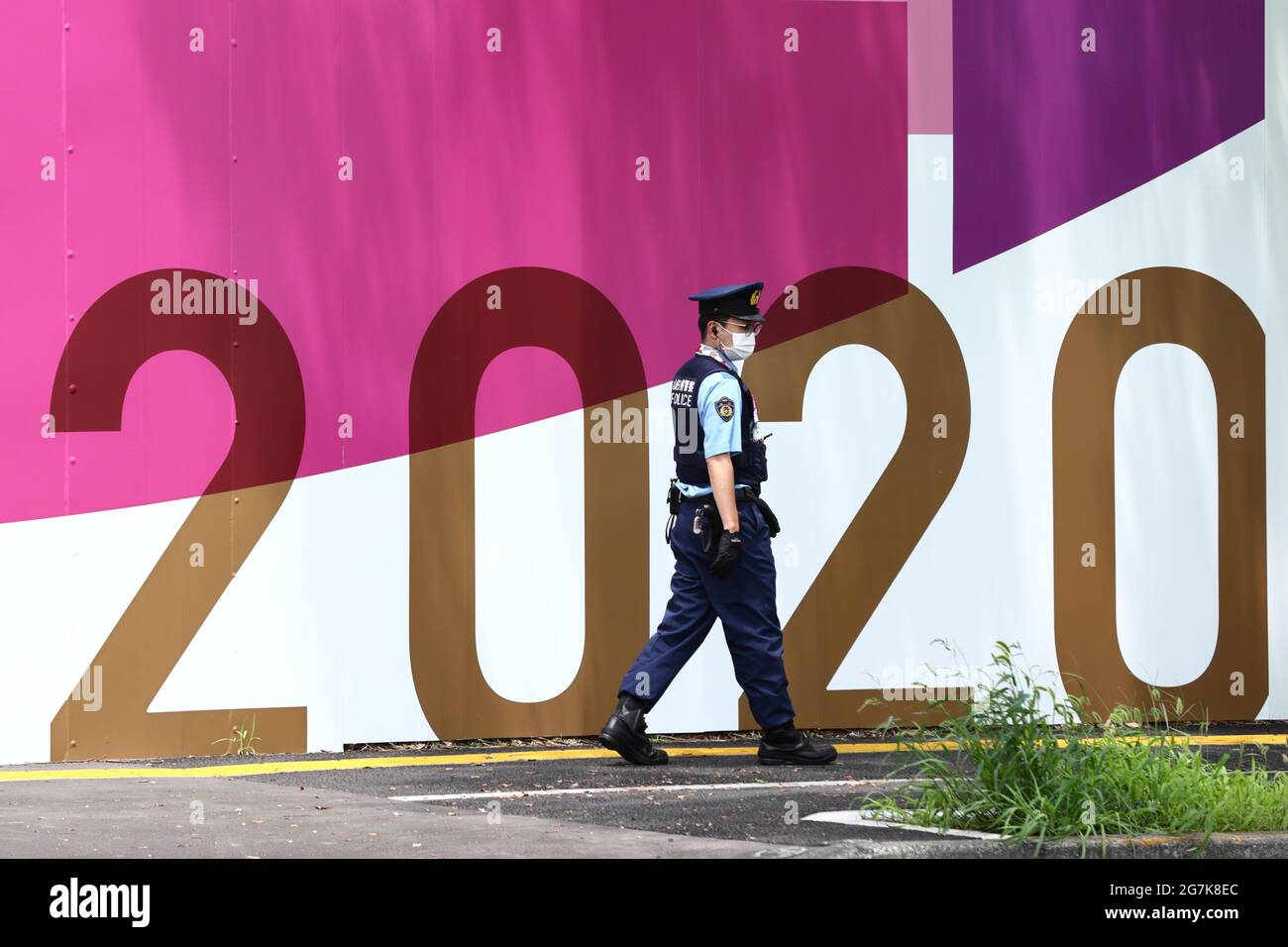 Tokyo, Japan. 14th July, 2021. A Japanese police officer is seen at Aomi area in Tokyo, Japan, July 14, 2021. Credit: Naoki Nishimura/AFLO SPORT/Alamy Live News Stock Photo
