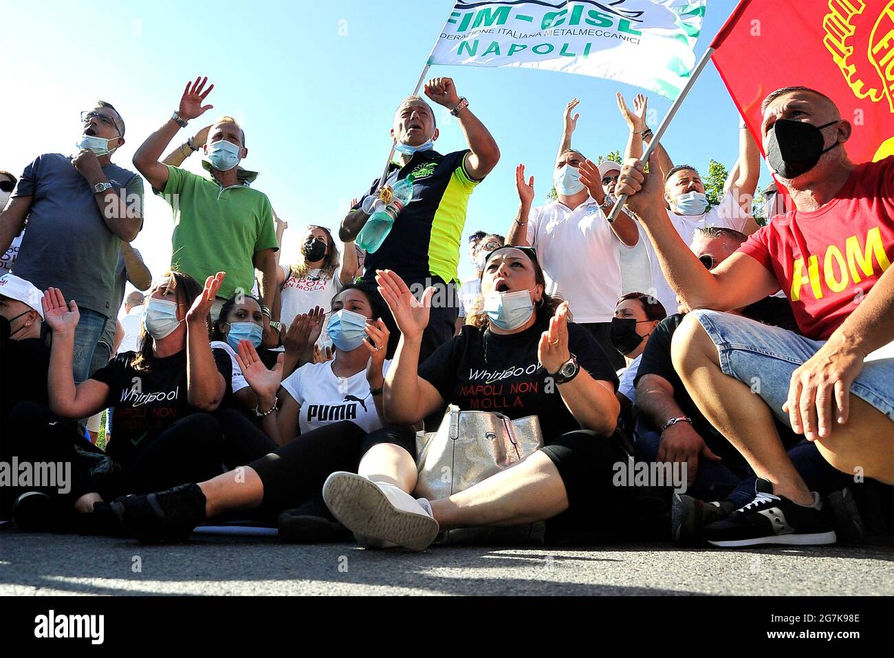 Santa Maria Capua Vetere, Italy. 14th July, 2021. Whirlpool company workers demonstrate against the dismissals, during the visit of the president of the council of ministers of the Italian republic Mario Draghi to the prison of Santa Maria Capua Vetere (CE). Santa Maria Capia Vetere, Italy, July 14. (photo by Vincenzo Izzo/Sipa USA) Credit: Sipa USA/Alamy Live News Stock Photo