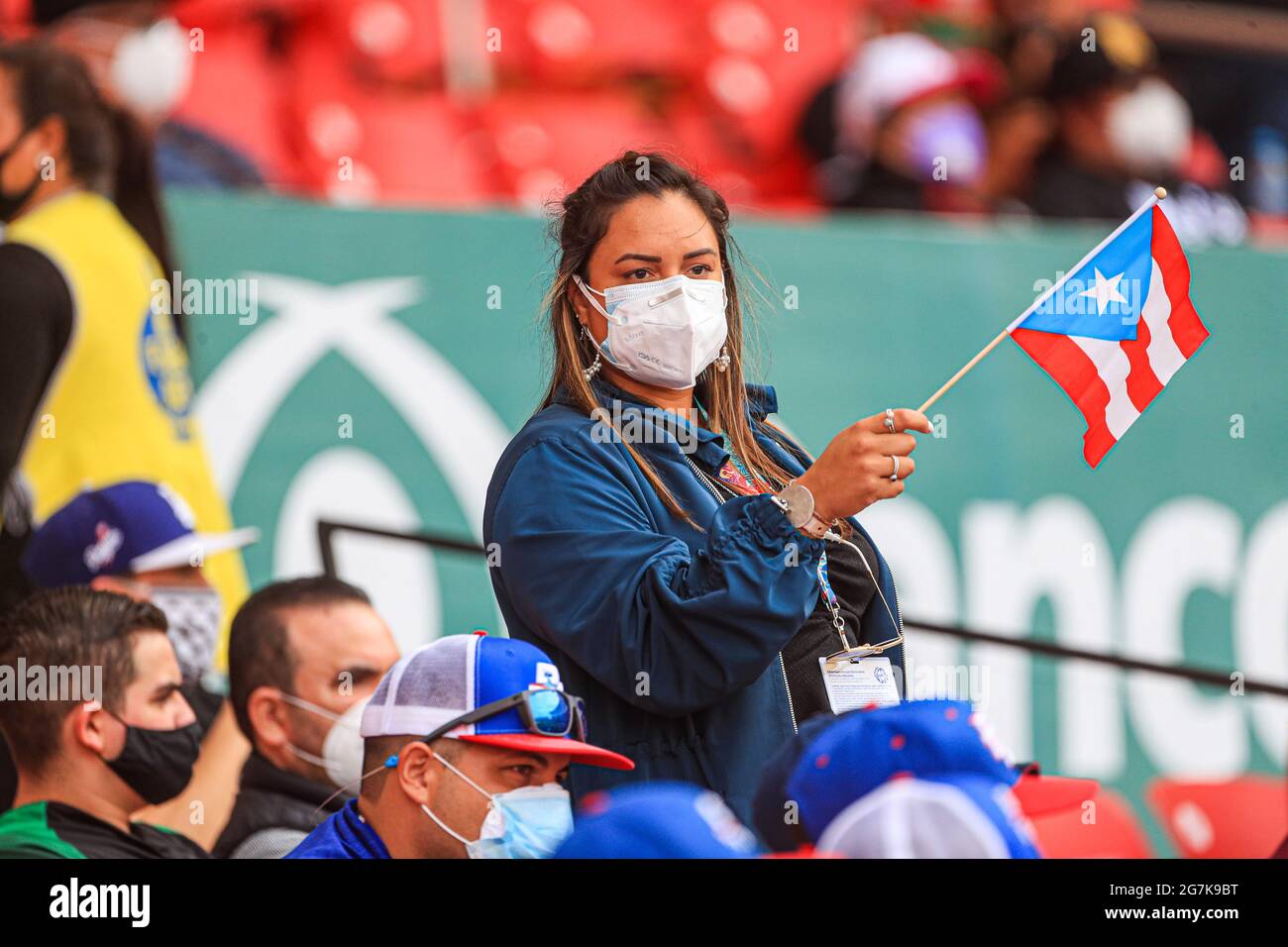 MAZATLAN, MEXICO - JANUARY 31: Puertorican Fans with masks due to Covid 19, during the game between Puerto Rico and Dominican Republic as part of Serie del Caribe 2021 at Teodoro Mariscal Stadium on January 31, 2021 in Mazatlan, Mexico. (Photo by Luis Gutierrez/Norte Photo/) Stock Photo