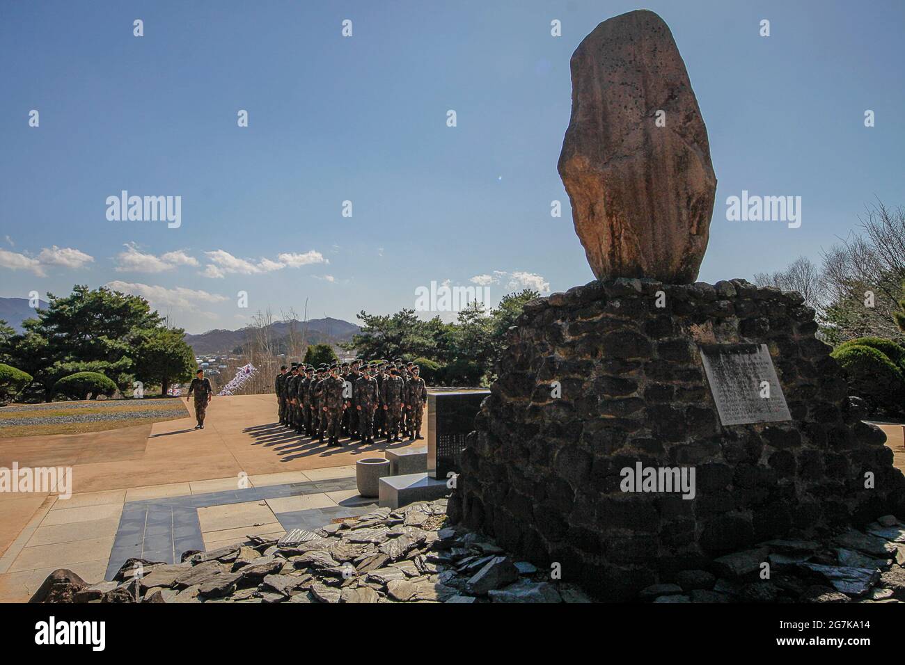 April 11, 2018-Goyang, South Korea-South Korean Army soldiers visit battle of white horse memorial monument in Cheorwon, South Korea. The Battle of White Horse was another in a series of bloody battles for dominant hilltop positions during the Korean War. Baengma-goji was a 395-metre (1,296 ft) hill in the Iron Triangle, formed by Pyonggang at its peak and Gimhwa-eup and Cheorwon at its base, was a strategic transportation route in the central region of the Korean peninsula. White Horse was the crest of a forested hill mass that extended in a northwest-to-southeast direction for about two mile Stock Photo