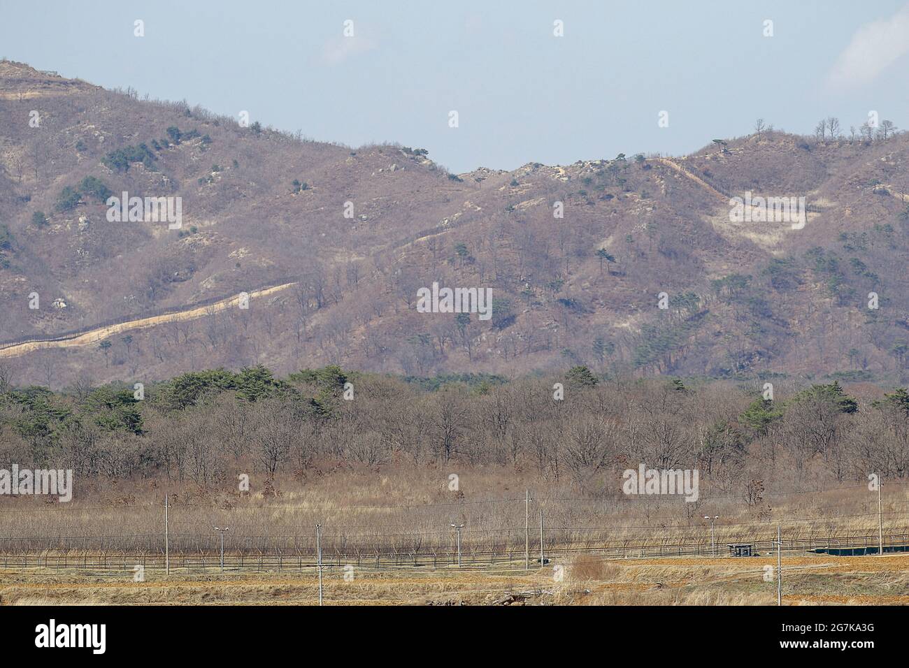 April 11, 2018-Goyang, South Korea-A View of Korean War battle of white horse and the Civilian Control Line in Cheorwon, South Korea. The Battle of White Horse was another in a series of bloody battles for dominant hilltop positions during the Korean War. Baengma-goji was a 395-metre (1,296 ft) hill in the Iron Triangle, formed by Pyonggang at its peak and Gimhwa-eup and Cheorwon at its base, was a strategic transportation route in the central region of the Korean peninsula. White Horse was the crest of a forested hill mass that extended in a northwest-to-southeast direction for about two mile Stock Photo