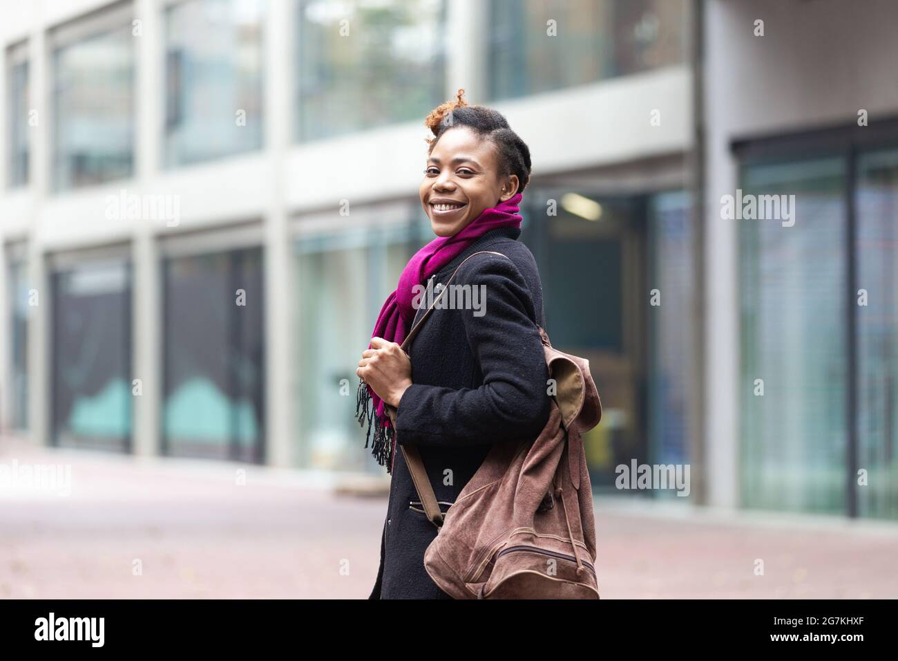 Portrait of black woman on the city street Stock Photo - Alamy