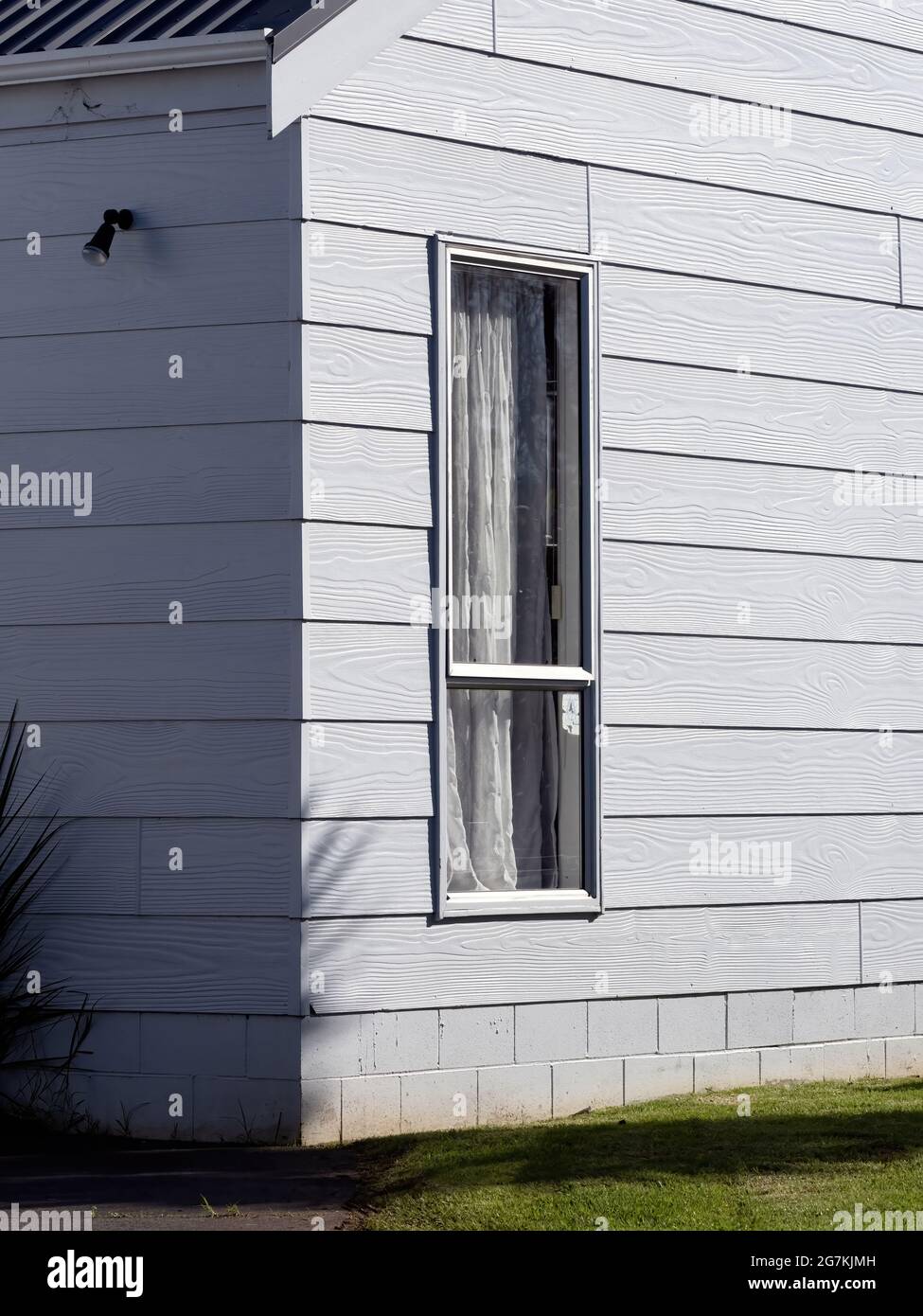 tall narrow window in house corner Stock Photo Alamy