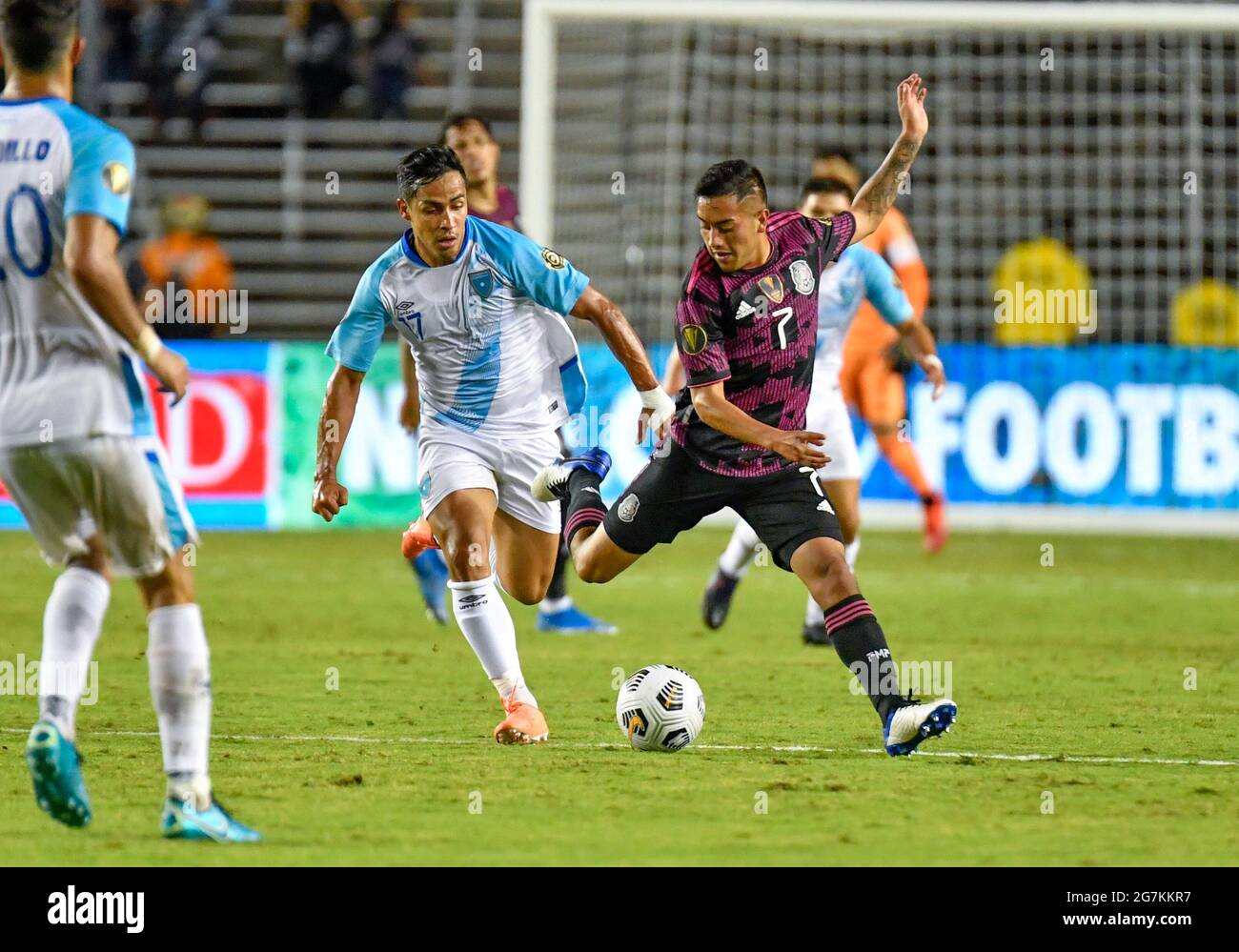 Jul 14, 2021: Guatamala forward Luis Martinez (17) and Mexico forward Erick Sanchez (7) battle for the ball in the second half during a CONCACAF Gold Cup game between Mexico and Guatemala at the Cotton Bowl Stadium in Dallas, TX Mexico defeated Guatemala 3-0Albert Pena/CSM Stock Photo