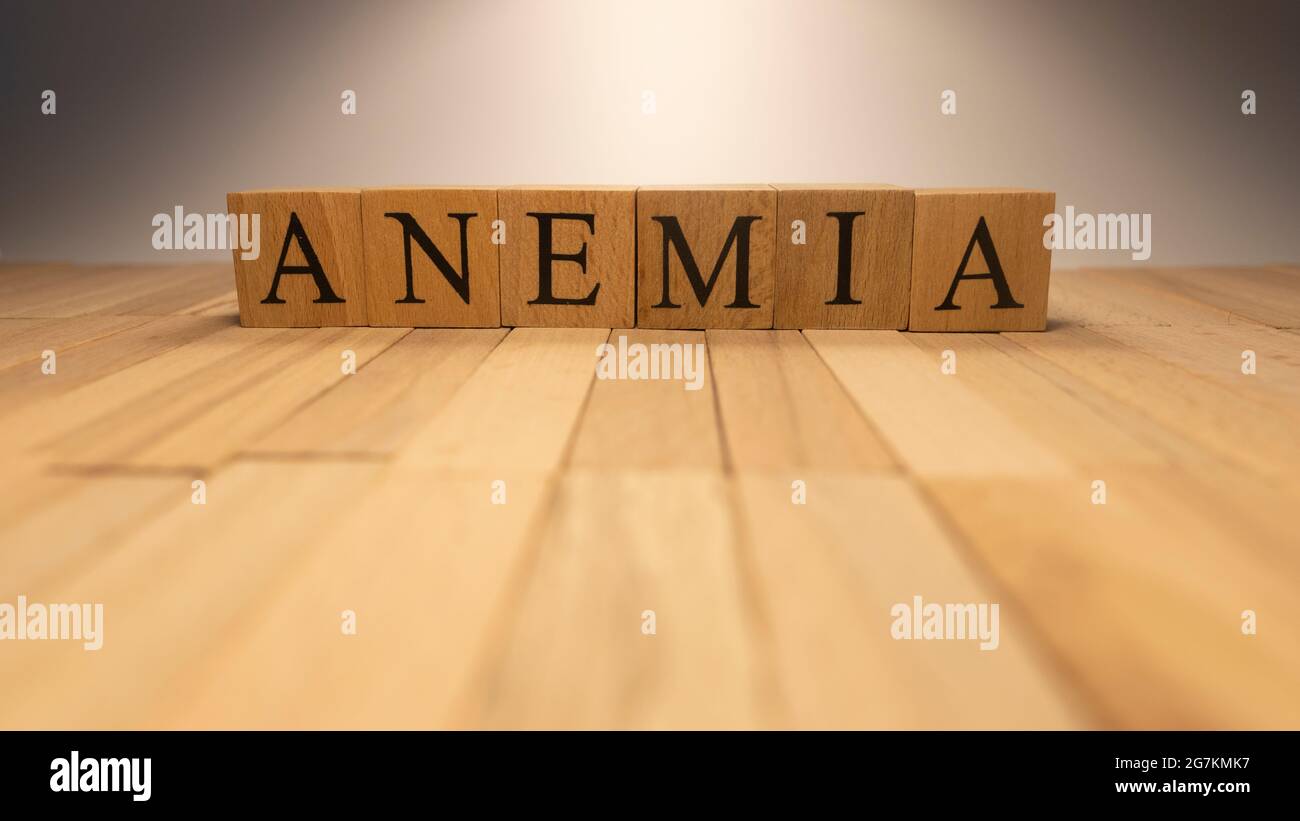 The word anemia was created from wooden letter cubes. Illness and