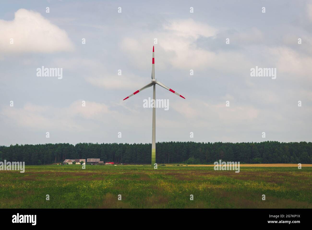 Single windmill generating electricity against blue sky.Beautiful wind ...