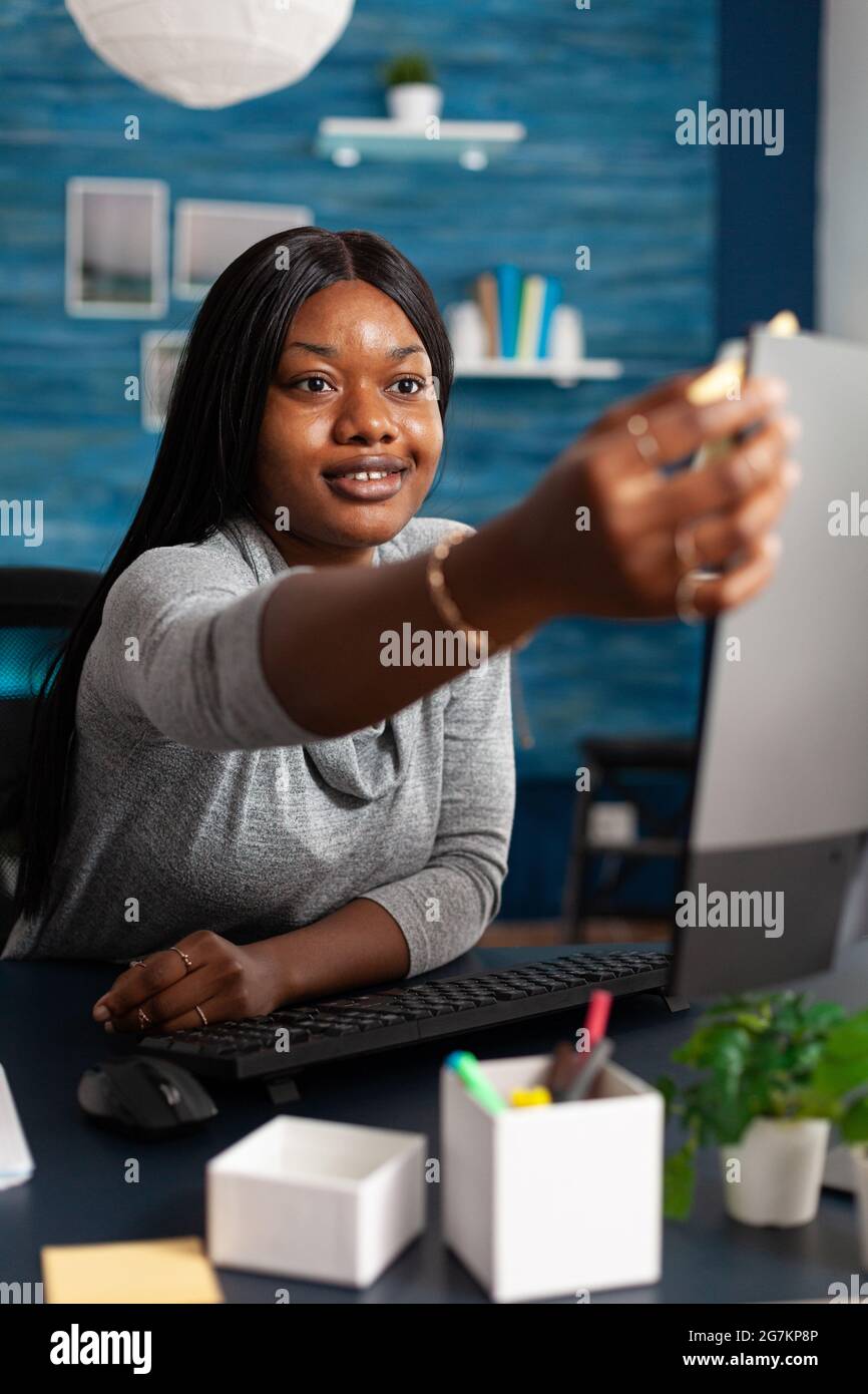 African american student studying business course using university ...