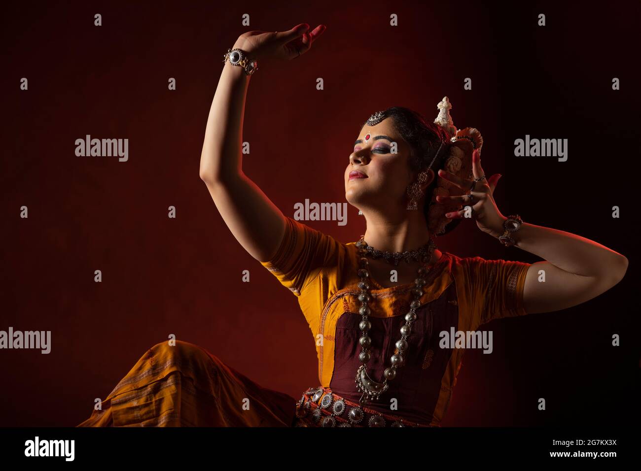 Odissi dancer striking a pose Stock Photo