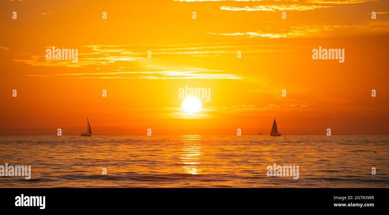 Sailing Yacht On Sunrise Seascape Golden Sunrise Over The Sea Tenerife Nature Landscape Beautiful Orange And Yellow Color On Ocean Sunset Stock Photo Alamy