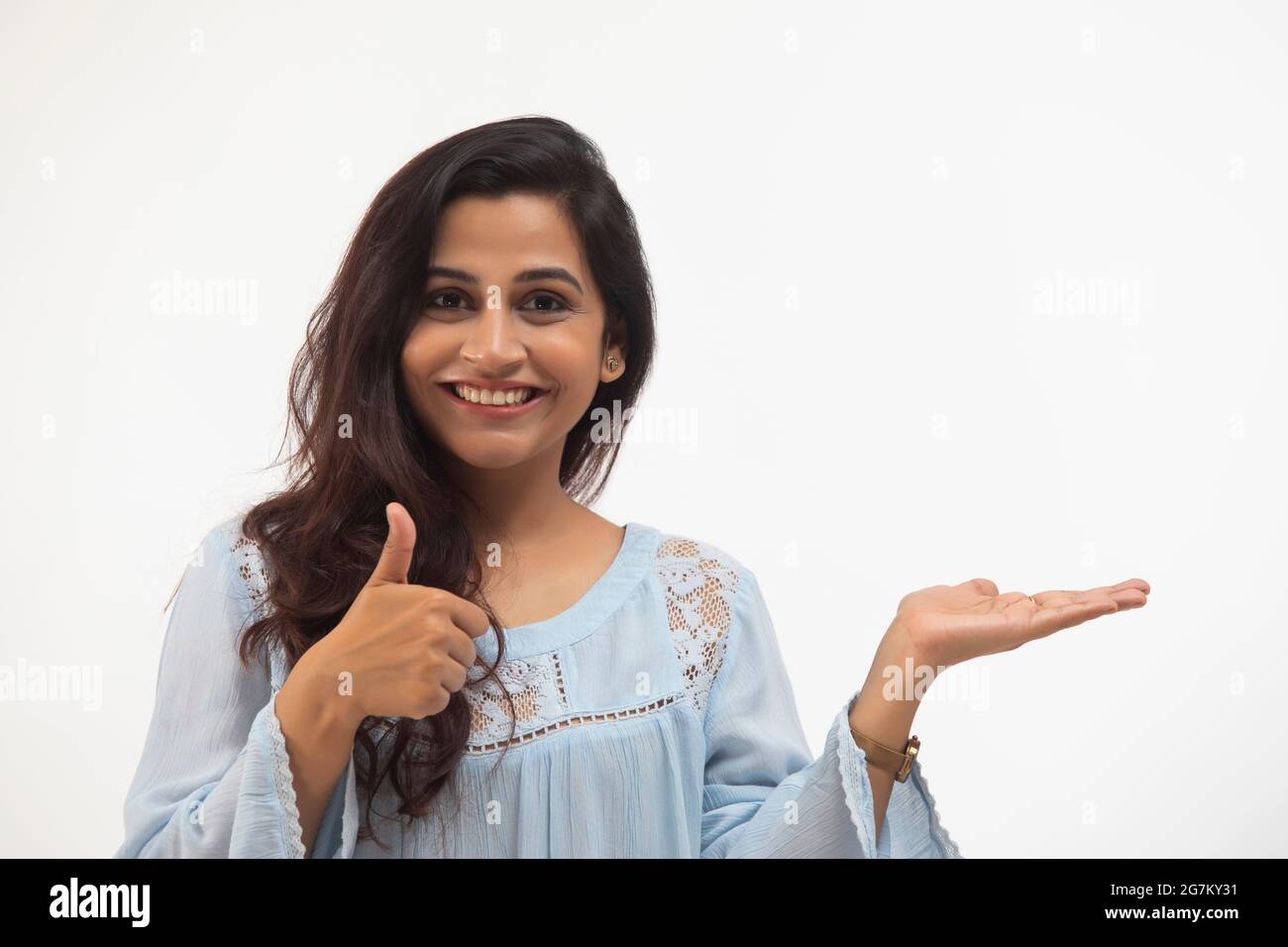 Indian woman showing thumbs up hi-res stock photography and images - Alamy