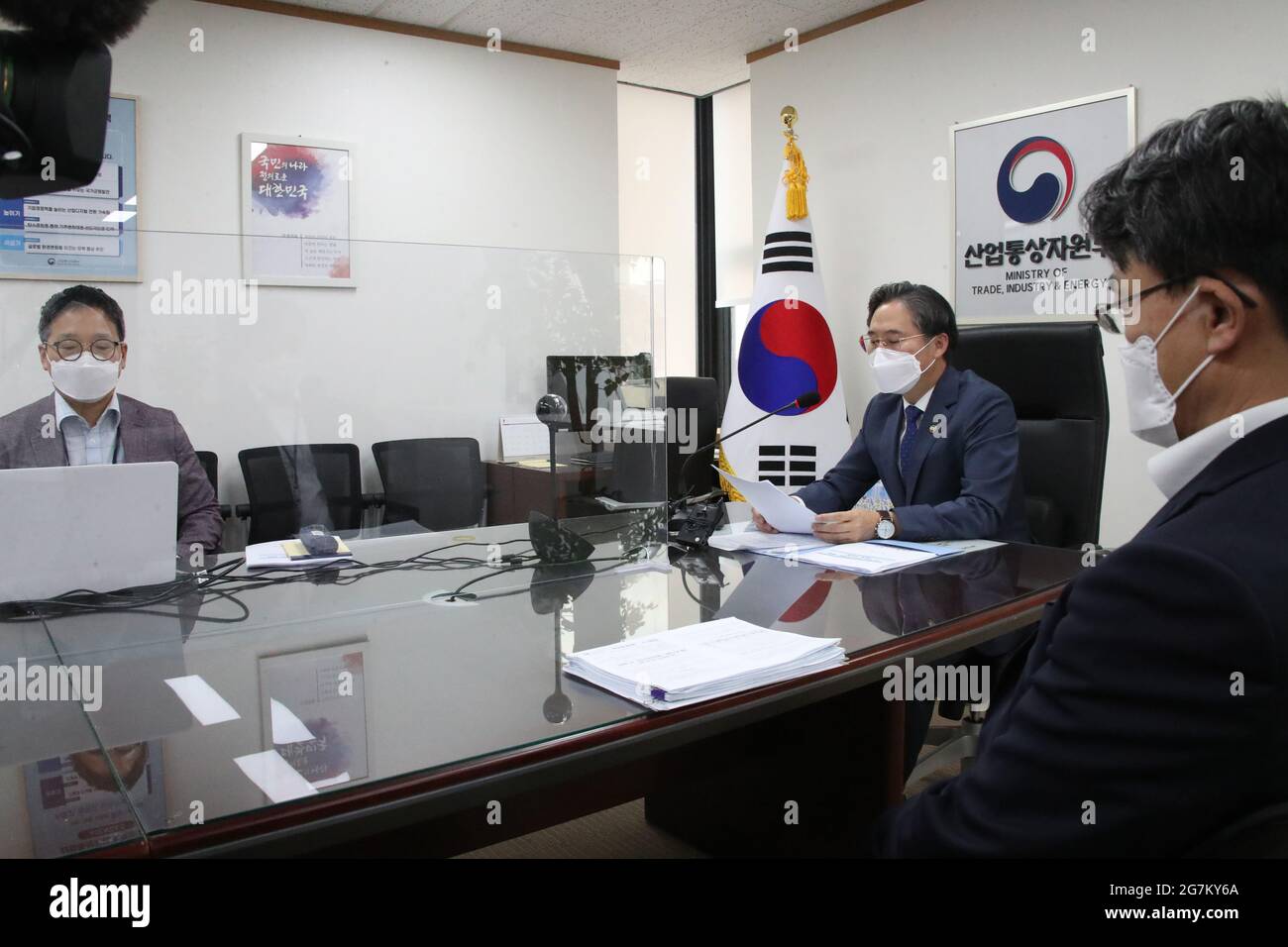 15th July, 2021. On EU's carbon border adjustment mechanism Vice Industry and Trade Minister Park Jin-kyu (C) holds a video conference with executives of steel and aluminium companies at the government complex in Seoul on July 15, 2021, to discuss measures to cope with the European Union's proposal for Carbon Border Adjustment Mechanism (CBAM) on steel and aluminium imports as part of a plan to decarbonize its economy by 2050. Credit: Yonhap/Newcom/Alamy Live News Stock Photo