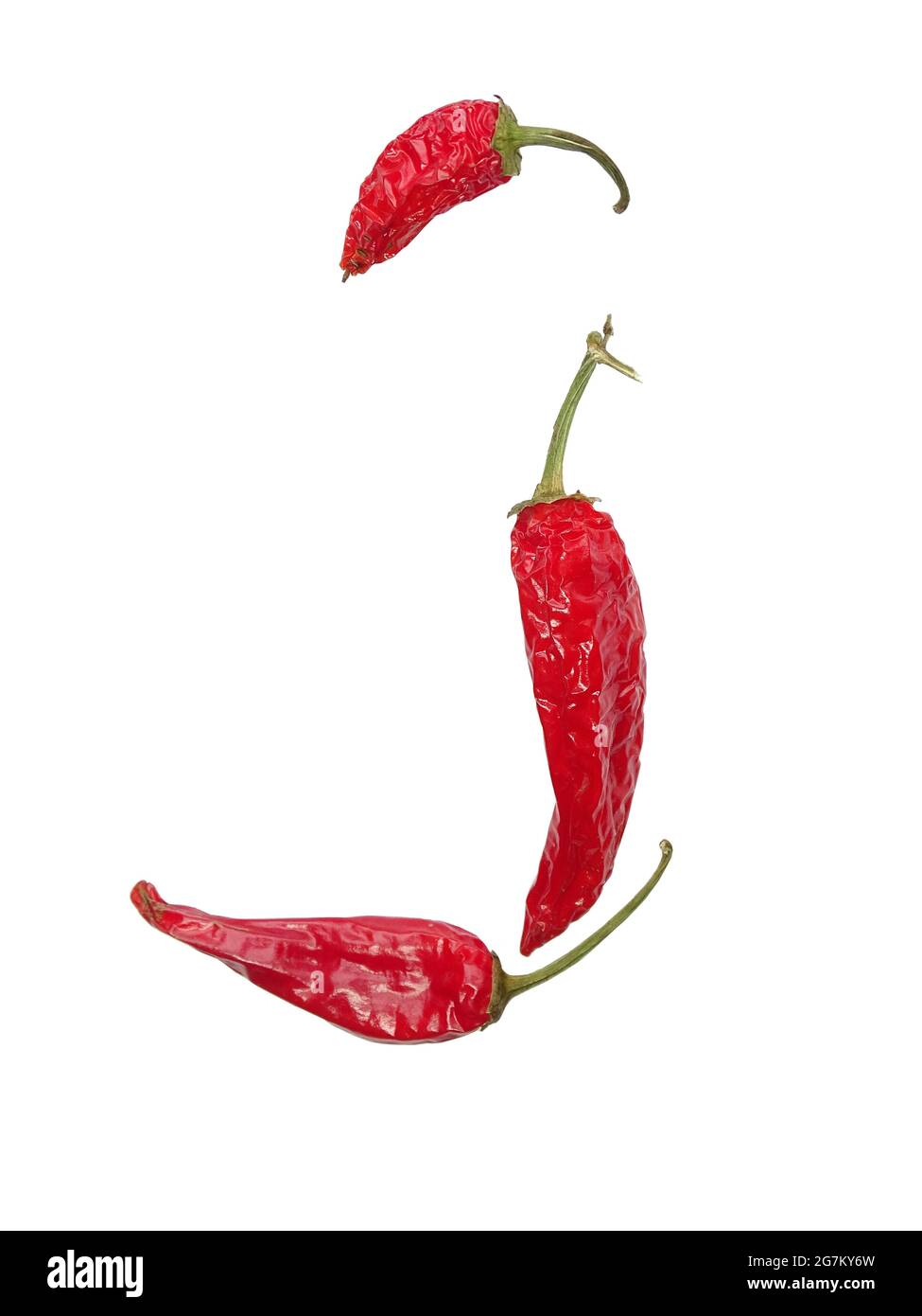 Letter J of the alphabet made with red pepper, isolated on a white background Stock Photo