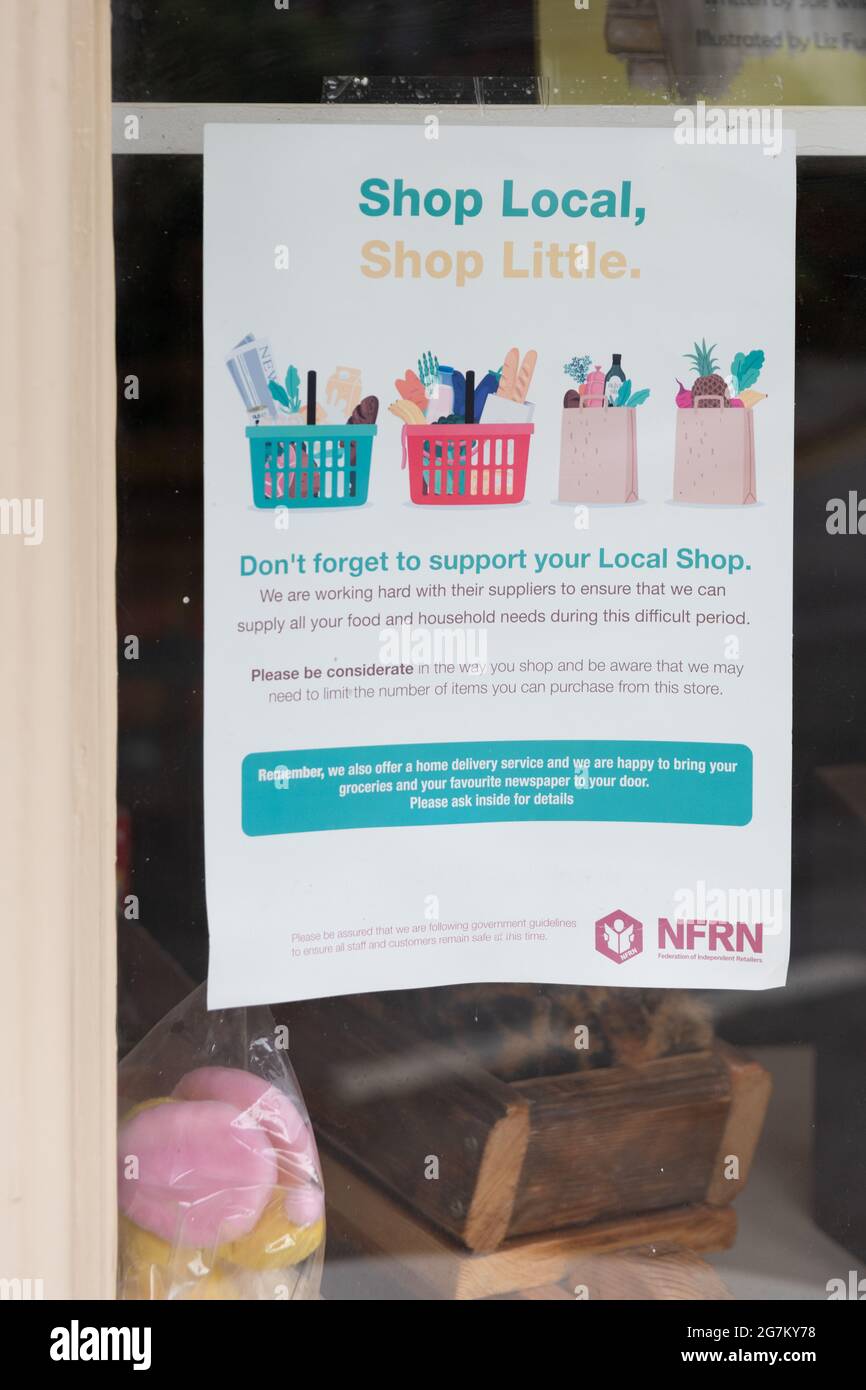 Shop Local Shop Little NFRN (federation of independent retailers) poster in village shop during coronavirus pandemic - England, UK Stock Photo