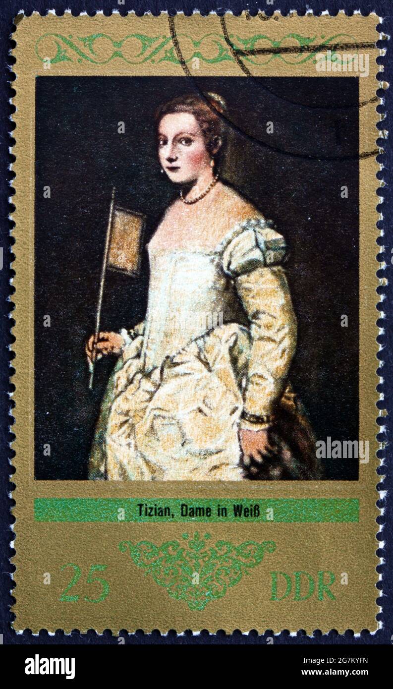 GERMANY - CIRCA 1973: a stamp printed in Germany shows Lady in White, Painting by Titian, circa 1973 Stock Photo