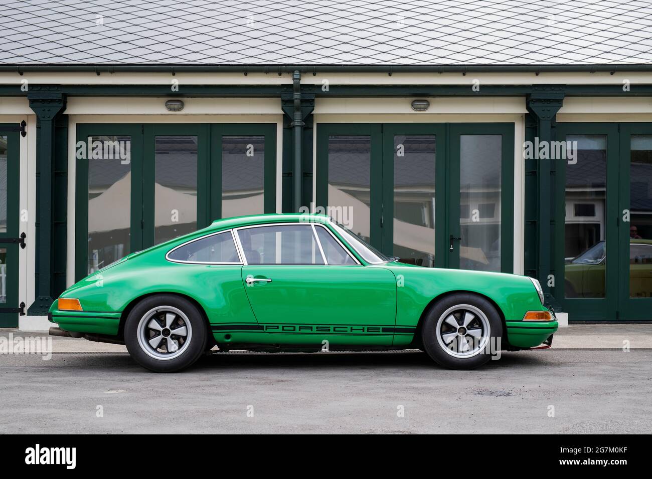 1971 Porsche 911 S-T car in front of a garage at Bicester heritage centre. Bicester, Oxfordshire, England Stock Photo