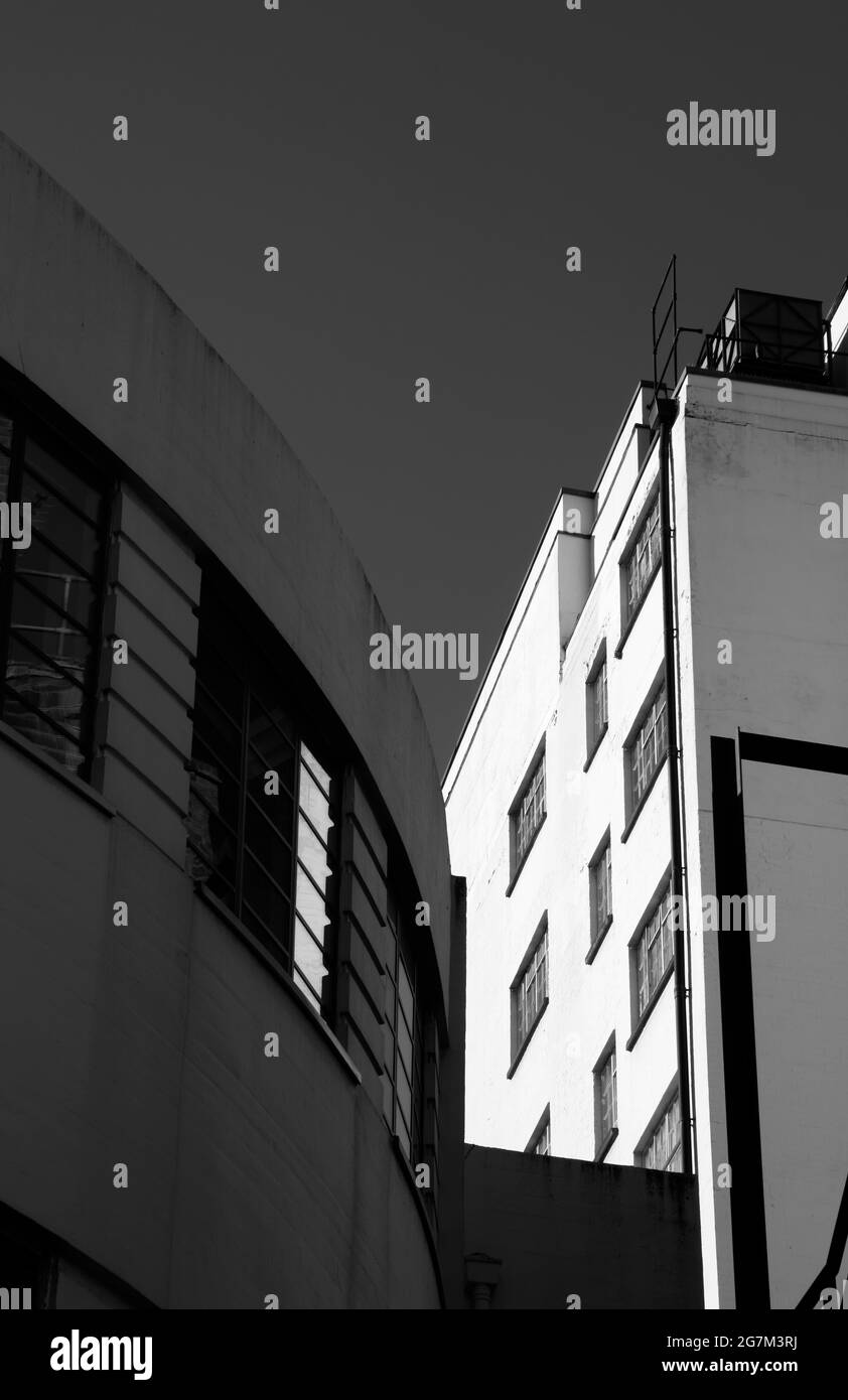 Facade of the old Daimler Car Hire Garage and the back of Russell Court, Herbrand Street, Bloomsbury, London, UK Stock Photo