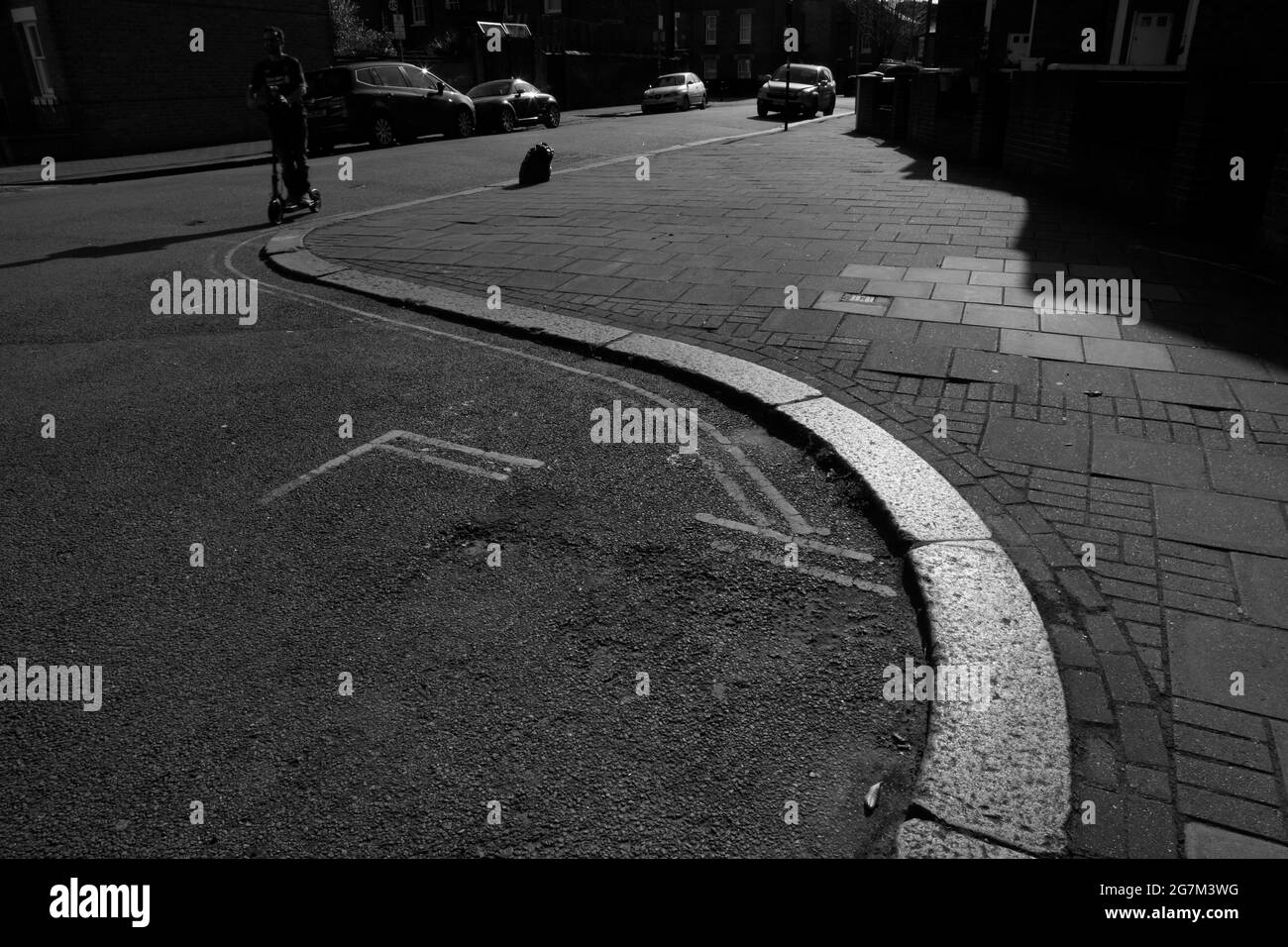 Scooter rider on Eversleigh Road, Battersea, London, UK Stock Photo Alamy