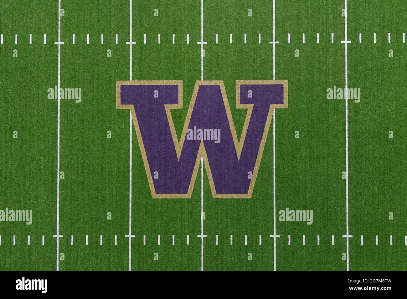 An aerial view of the Washington Huskies logo at midfield of Husky