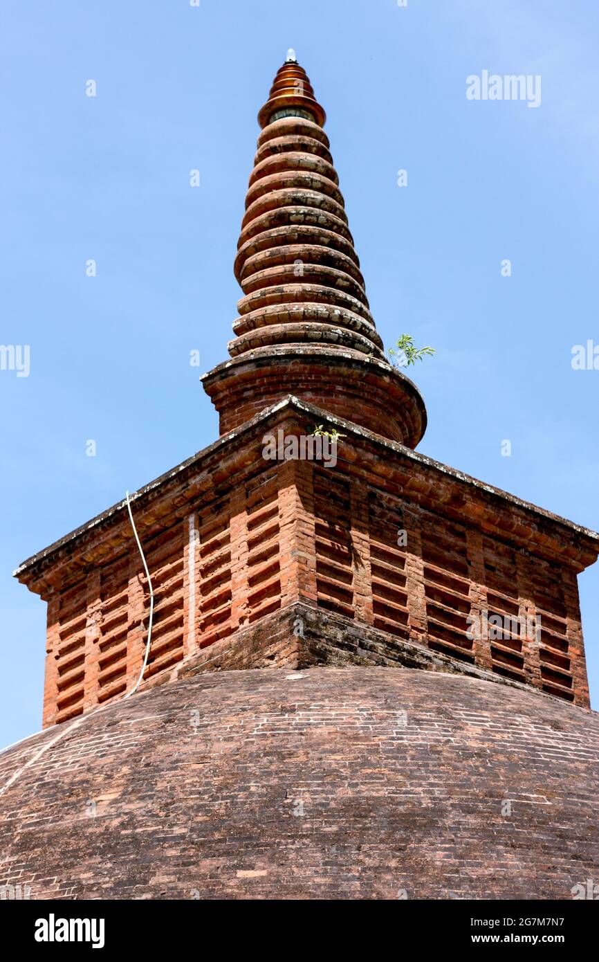 Vertical shot of ancient Buddhist religious monuments in Sri Lanka