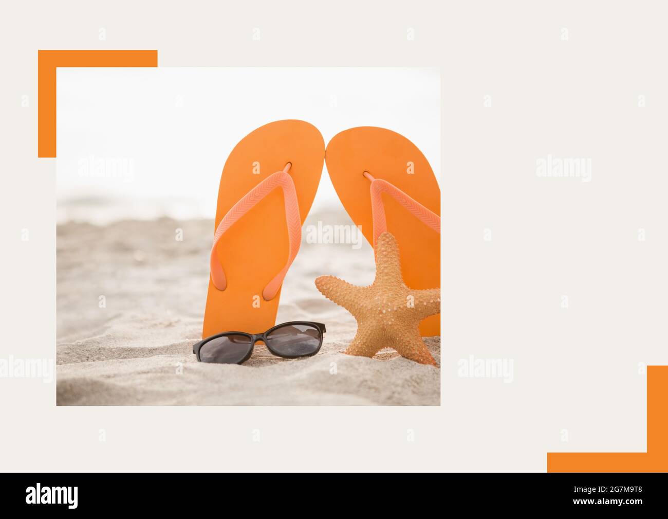 Photograph of flip flops, sunglasses and starfish at the beach against