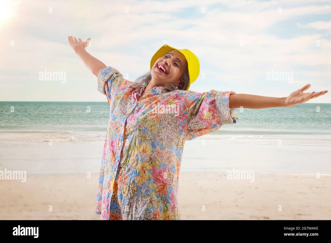 Carefree mature woman sunbathing hi-res stock photography and images ...