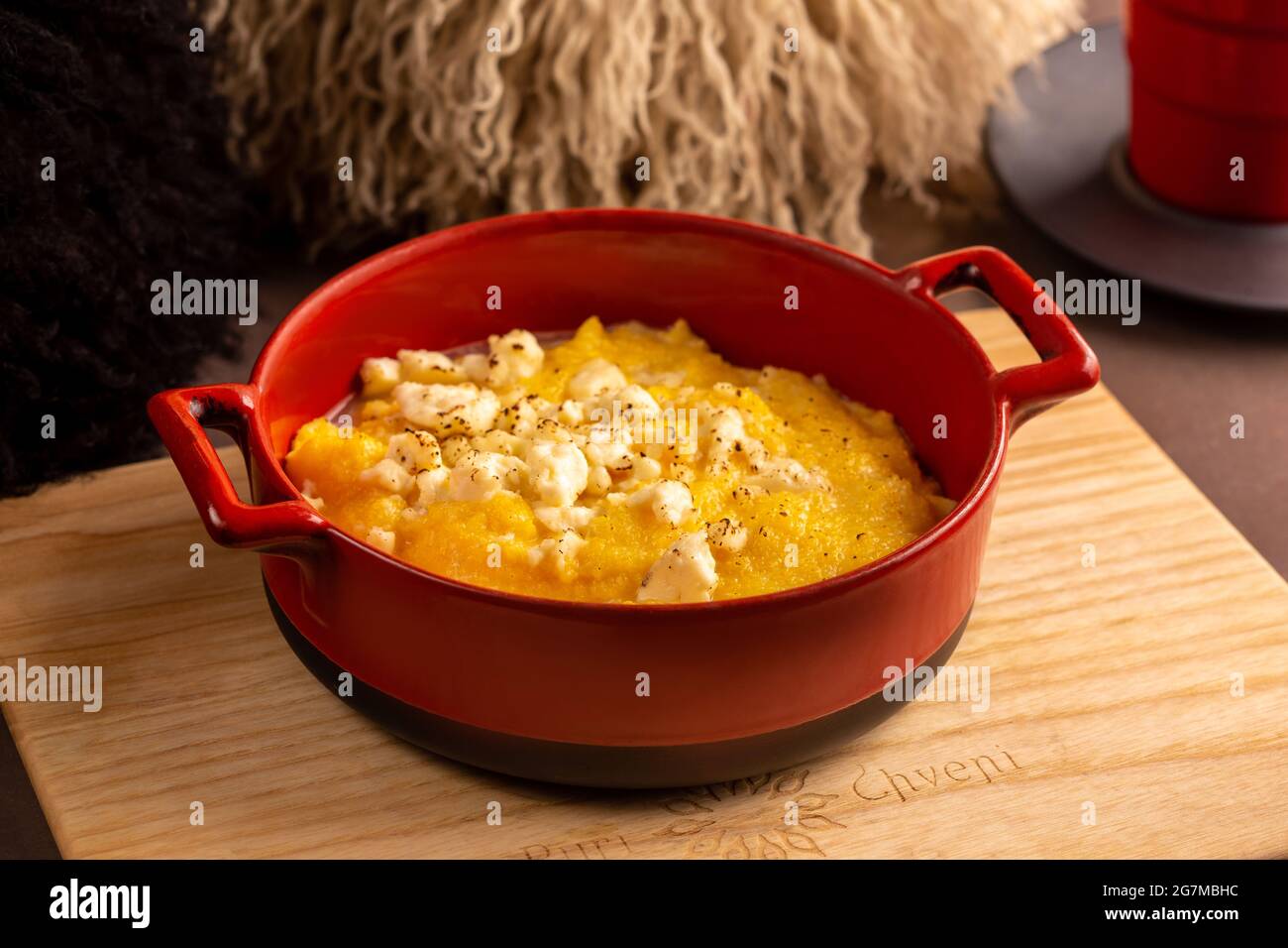 Elarji porridge from coarse cornmeal with Sulguni cheese Stock Photo