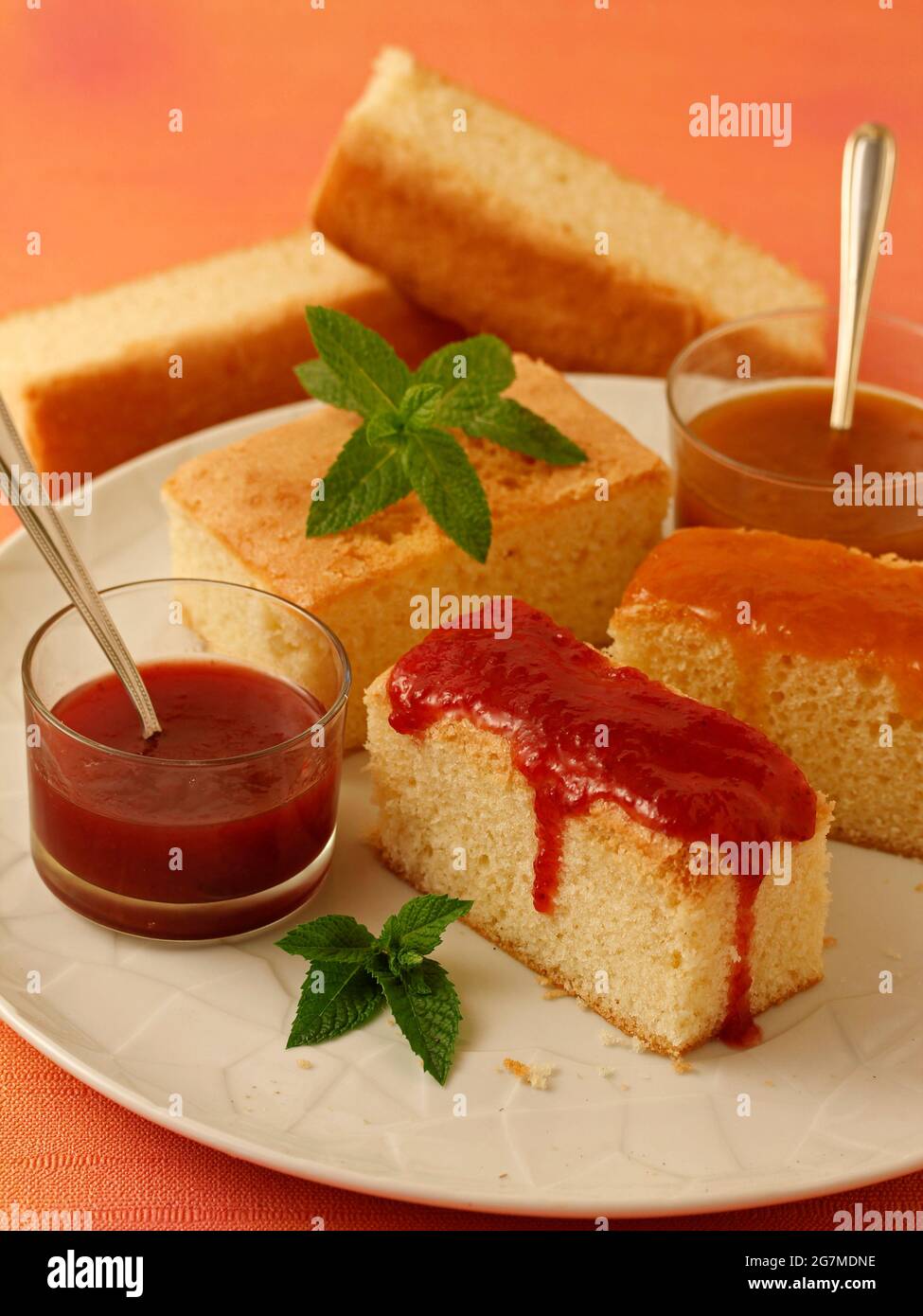 Sponge cake with jams. Stock Photo
