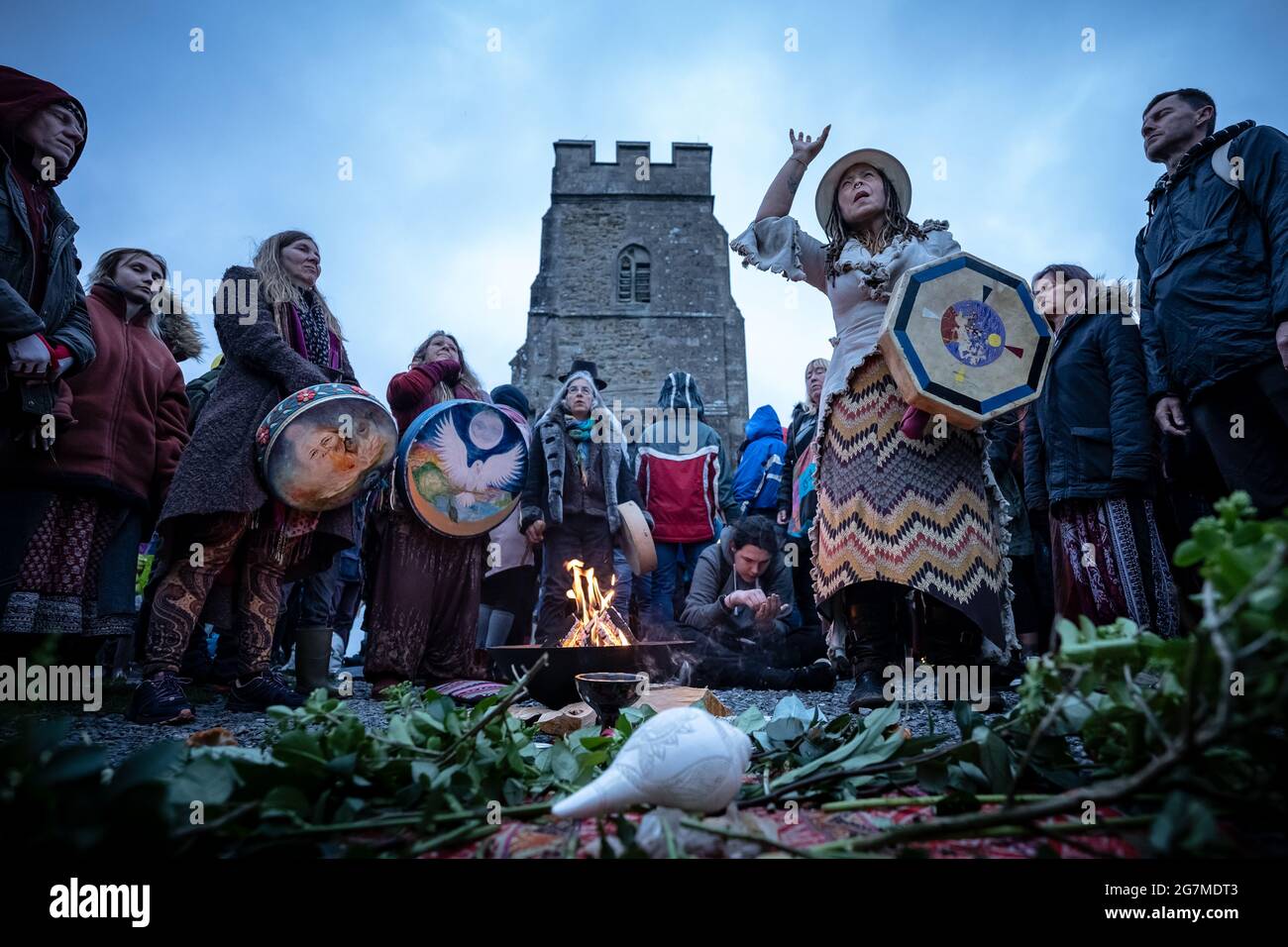 Summer Solstice celebrations on Glastonbury Tor with revellers