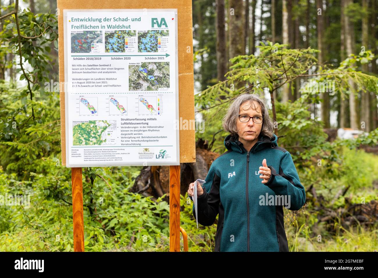 Albbruck, Germany. 15th July, 2021. Dr. Petra Adler from the Forest Research Institute explains the satellite monitoring of the forest in the southern Black Forest. The southern Black Forest is one of the regions in Baden-Württemberg most affected by extreme weather-related forest damage. In order to develop solutions, the forest was declared a model area. The aim of the project is to support and quickly help forest owners both in dealing with the damage and in reforesting the damaged areas. Credit: Philipp von Ditfurth/dpa/Alamy Live News Stock Photo