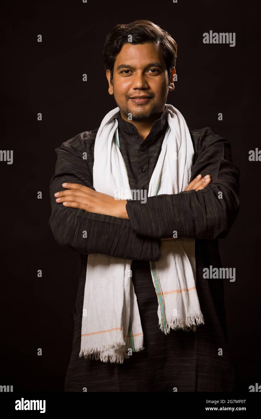 Indian man standing confidently hi-res stock photography and images - Alamy