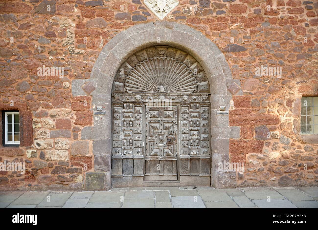 An old doorway in the close of Exeter Cathedral in Devon. Stock Photo
