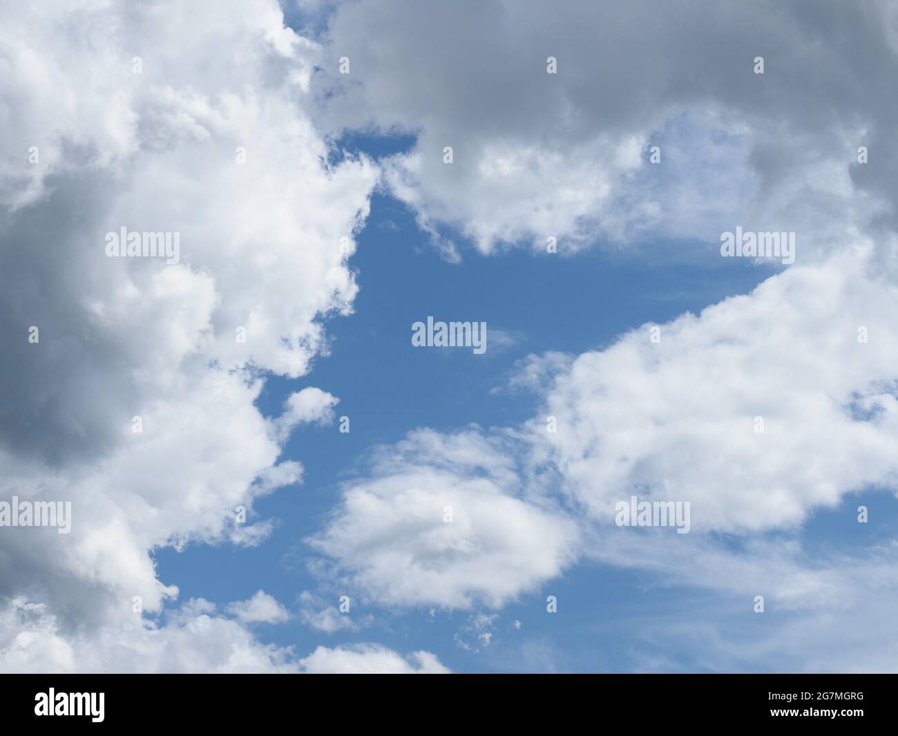 dramatic stormy blue sky with clouds useful as a background Stock Photo ...