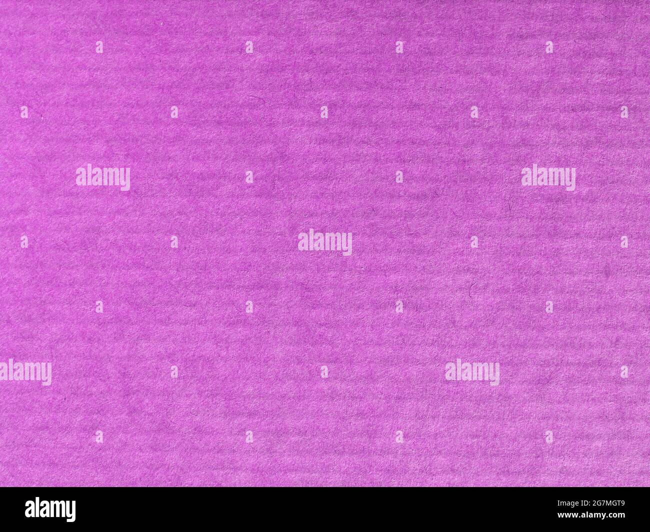 pink corrugated cardboard texture useful as a background Stock Photo