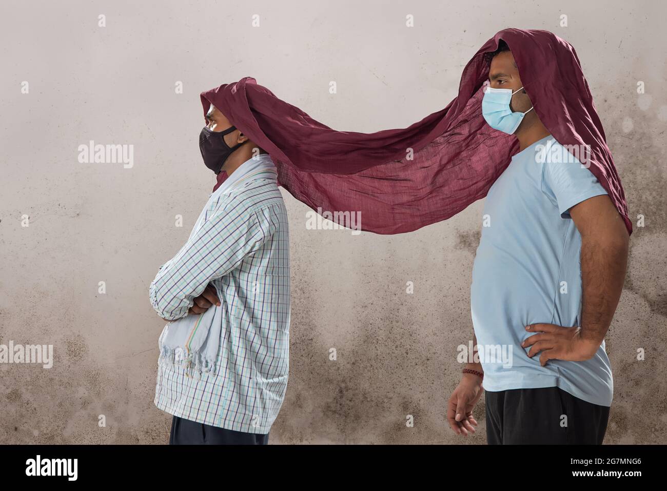 TWO LABOURERS STANDING WITH CLOTH COVERING THEIR HEADS Stock Photo Alamy
