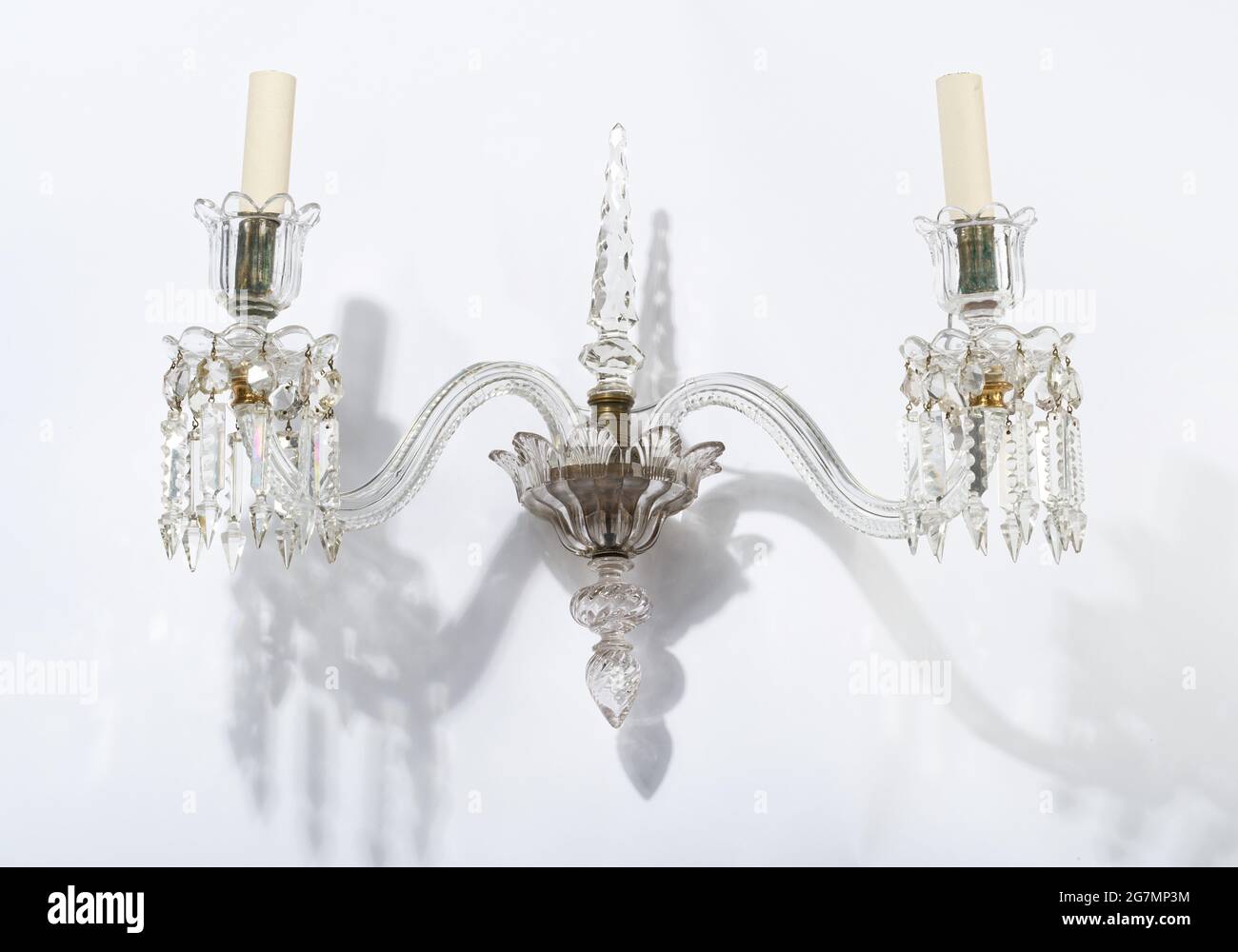 Lighting sconce. Crystal glass wall sconce, with glass drops. Stock Photo