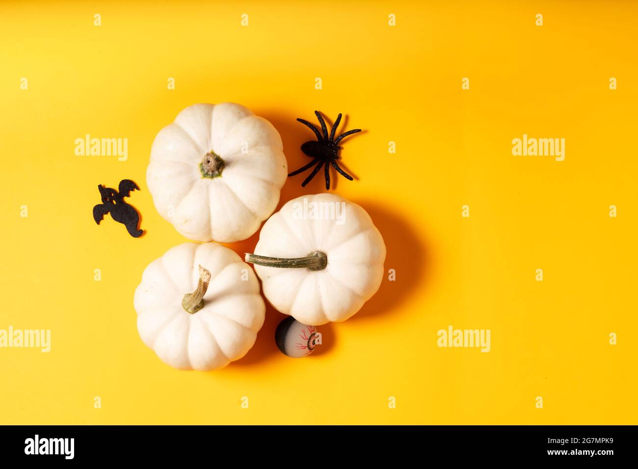 Halloween scene on orange background Stock Photo - Alamy