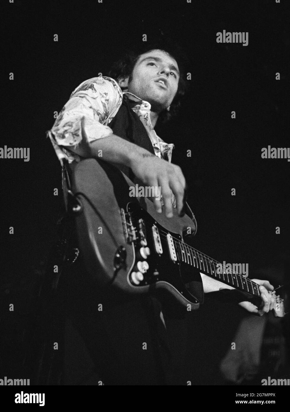 Nils Lofgren performs live in Amsterdam, Netherlands, 1975 (Photo by Gijsbert Hanekroot) Stock Photo