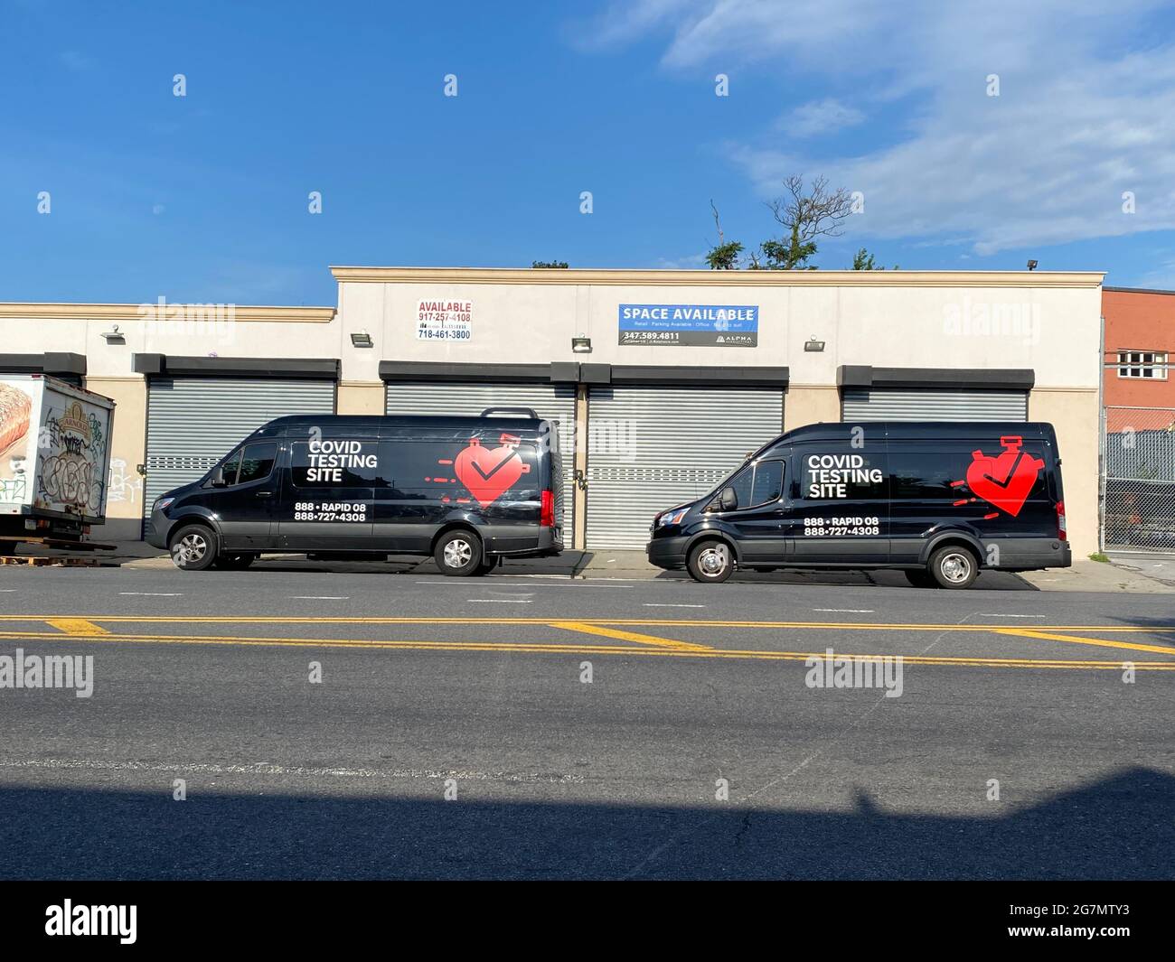 A fleet of Mobile Covid-19 testing sites are on the streets of Brooklyn. Stock Photo