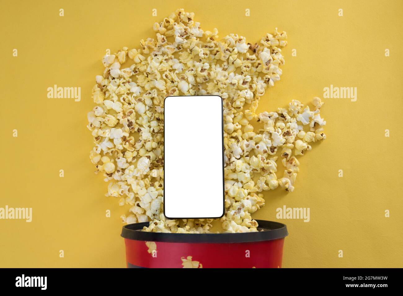 An illustration of popcorn popping out behind a mobile Stock Photo Alamy