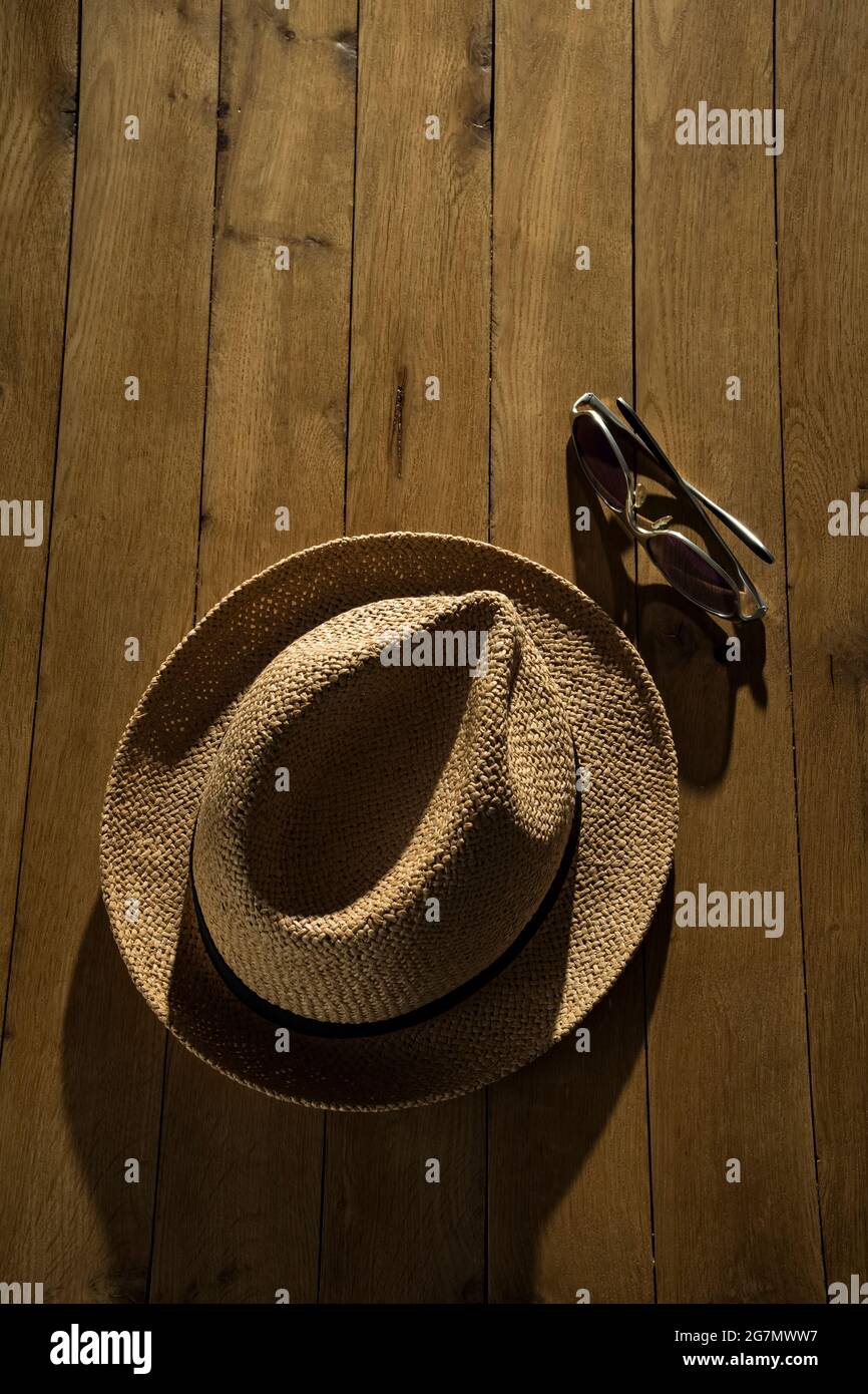 Straw hat and sunglasses. Stock Photo