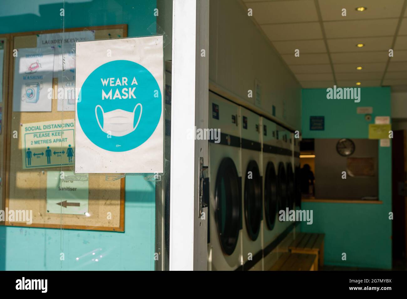 Windsor, Berkshire, UK. 14th July, 2021. A Covid19 wear a mask sign
