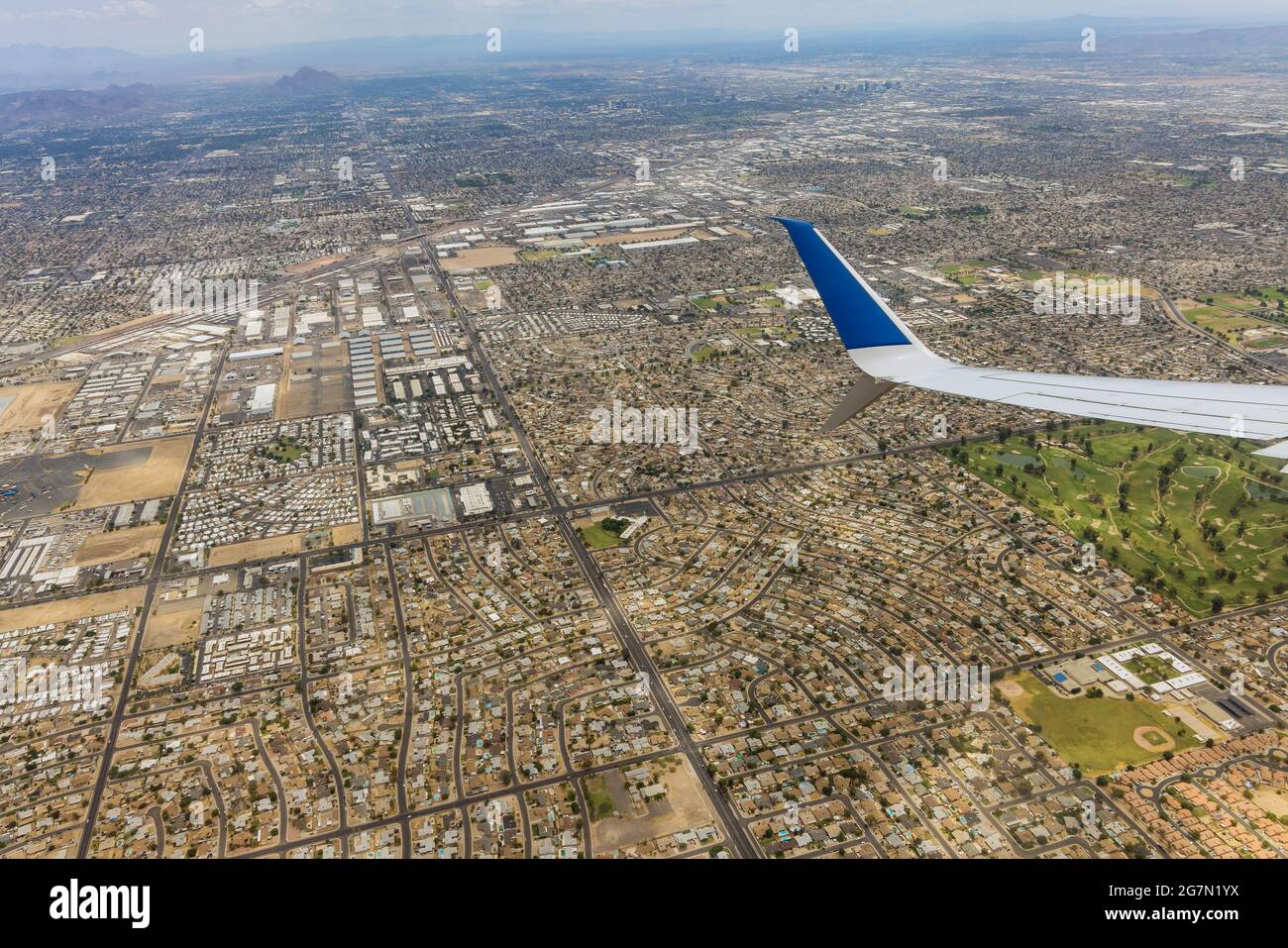 Flight on an airplane over downtown Phoenix Arizona Stock Photo