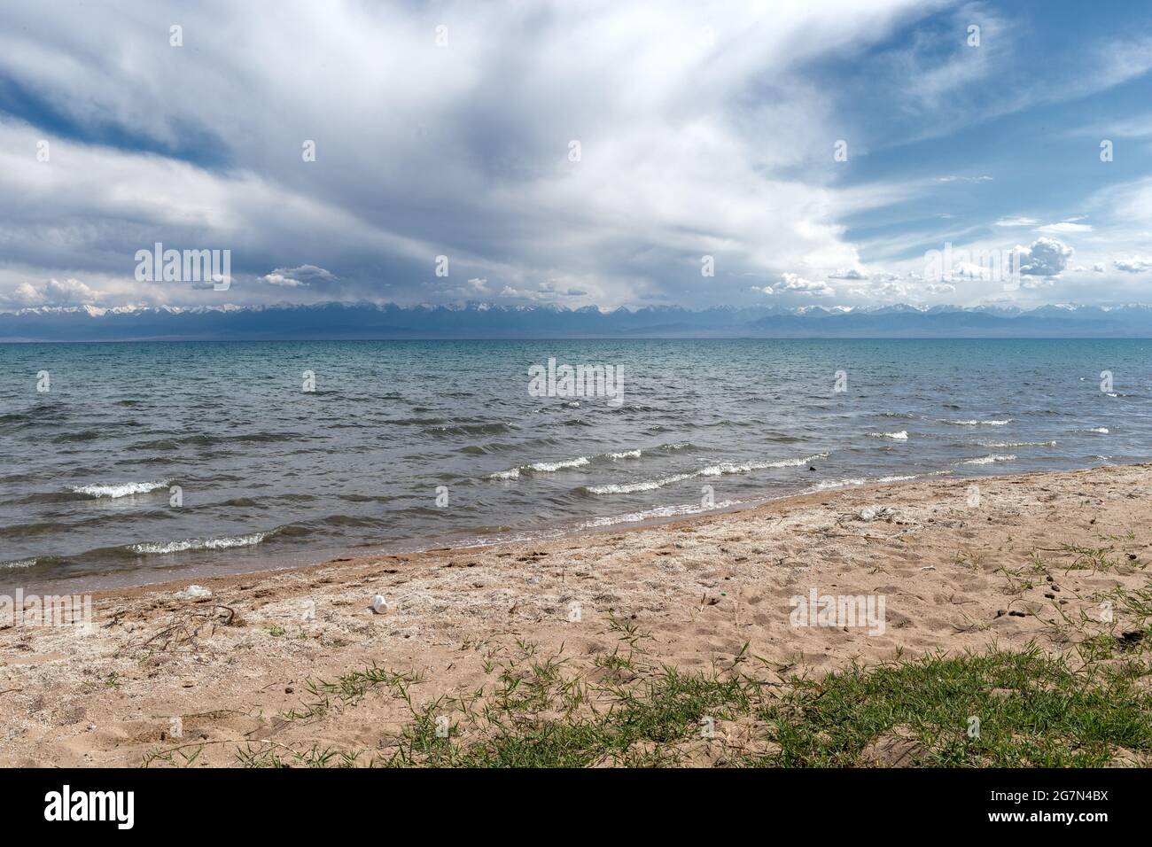 Issyk Kul lake, with mountains on horizon, Kyrgyzstan, Stock Photo