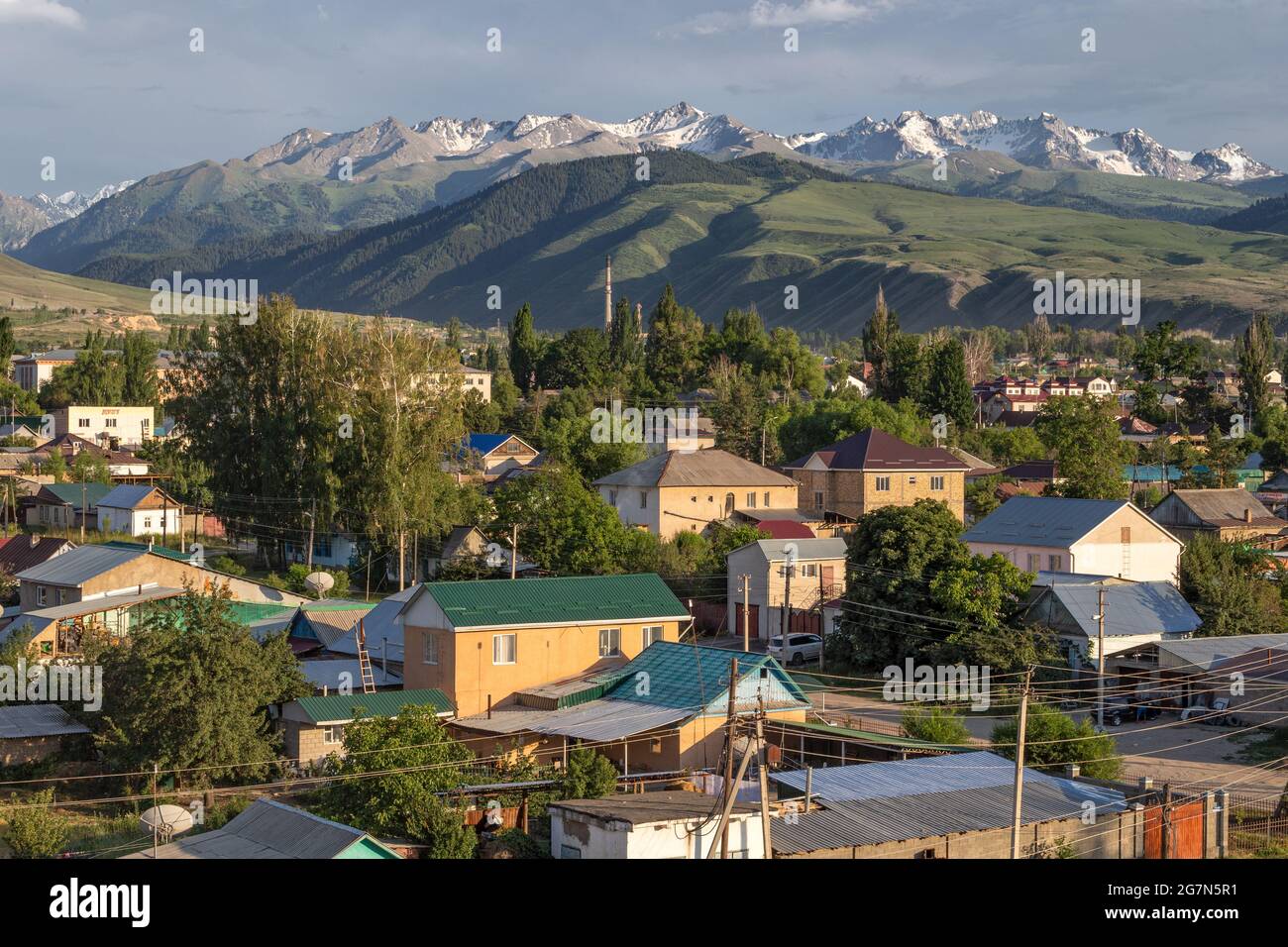 Terskey Alatau or Terskey Ala-Too mountain range in the Tian Shan mountains behind Karakol, Kyrgyzstan Stock Photo