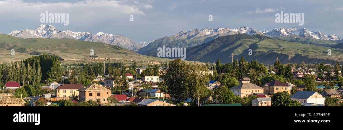 Terskey Alatau or Terskey Ala-Too mountain range in the Tian Shan mountains behind Karakol, Kyrgyzstan Stock Photo