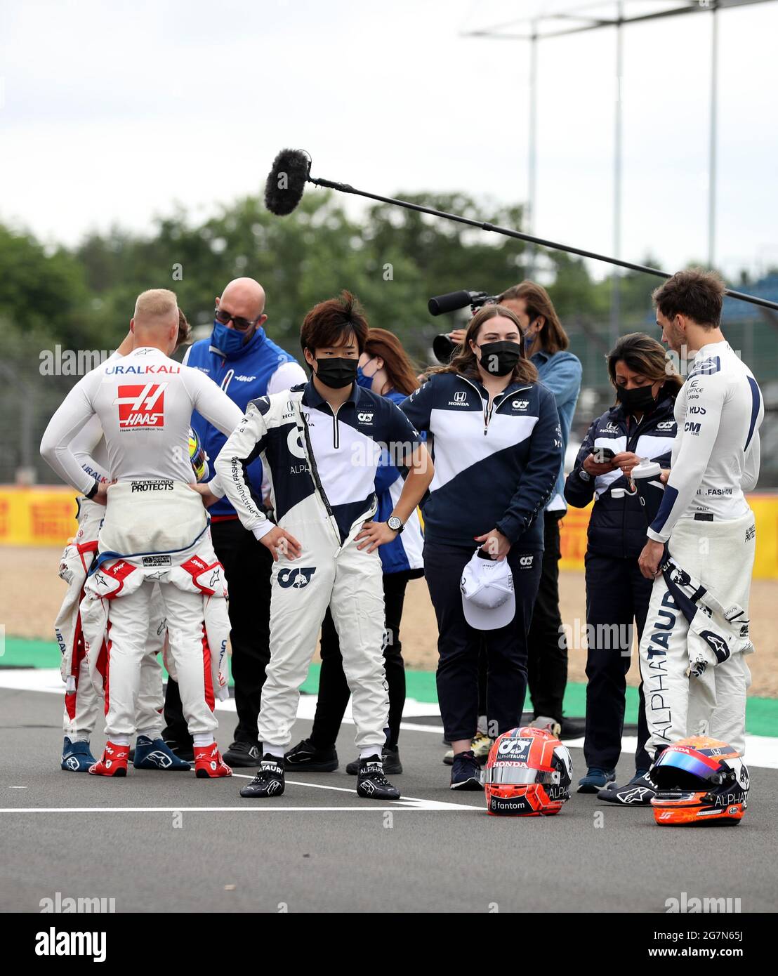 AlphaTauri’s Pierre Gasly and Yuki Tsunoda in the paddock ahead of the
