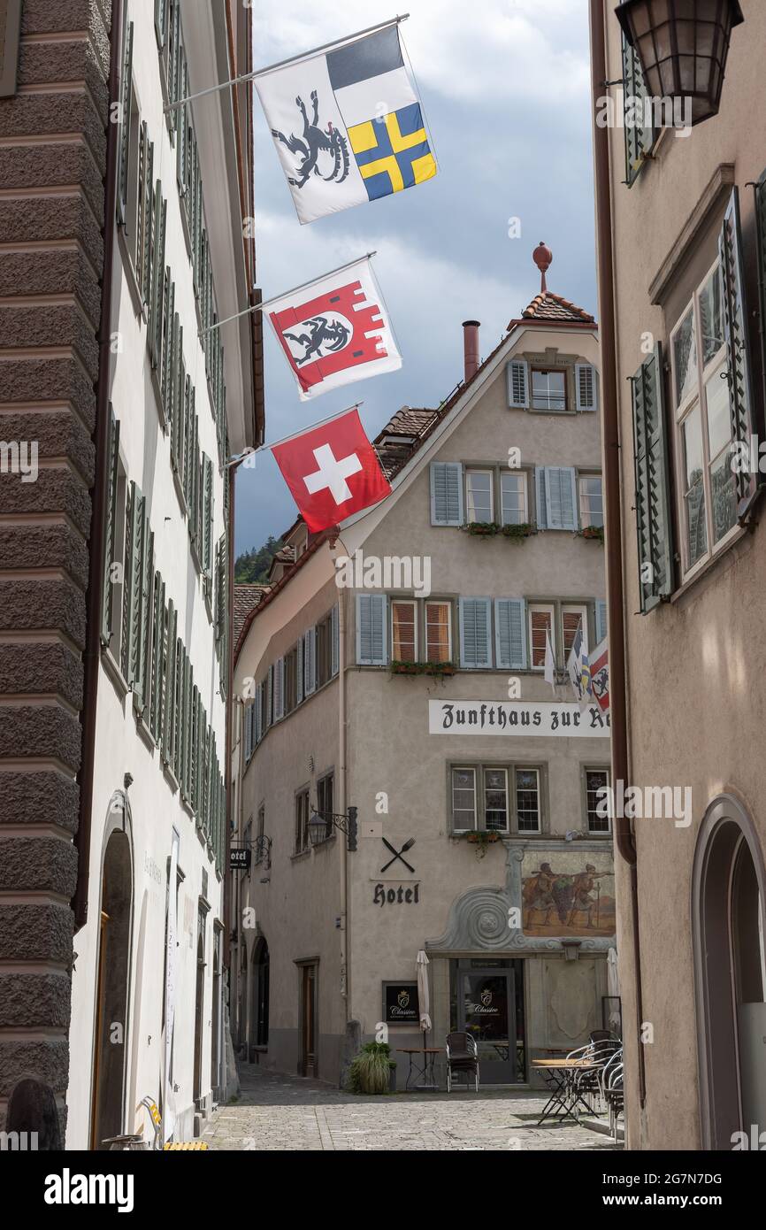 flags in the old town of chur Stock Photo